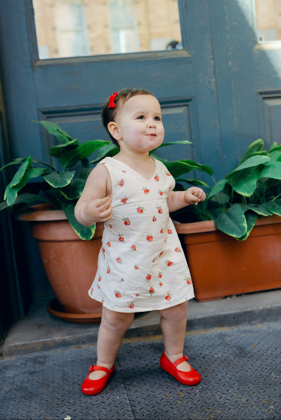 Little Gili Red Posey toddler girls floral dress, cream cotton Easter spring summer kids dress with red rose print by Puka The Label