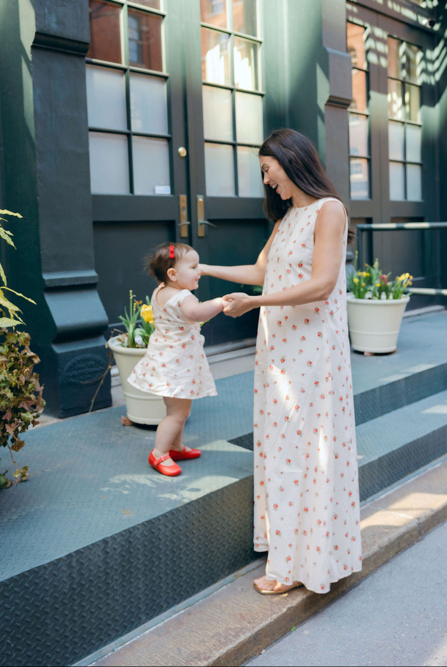 Mommy and Me sweet moment in matching Red Posey spring summer floral girls kids dress and adult maxi dress by Puka The Label
