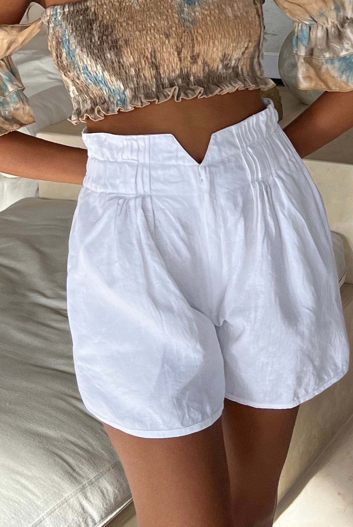 Puka Pantai Short white linen — breathable lightweight linen shorts for women, perfect beach and resort vacation outfit