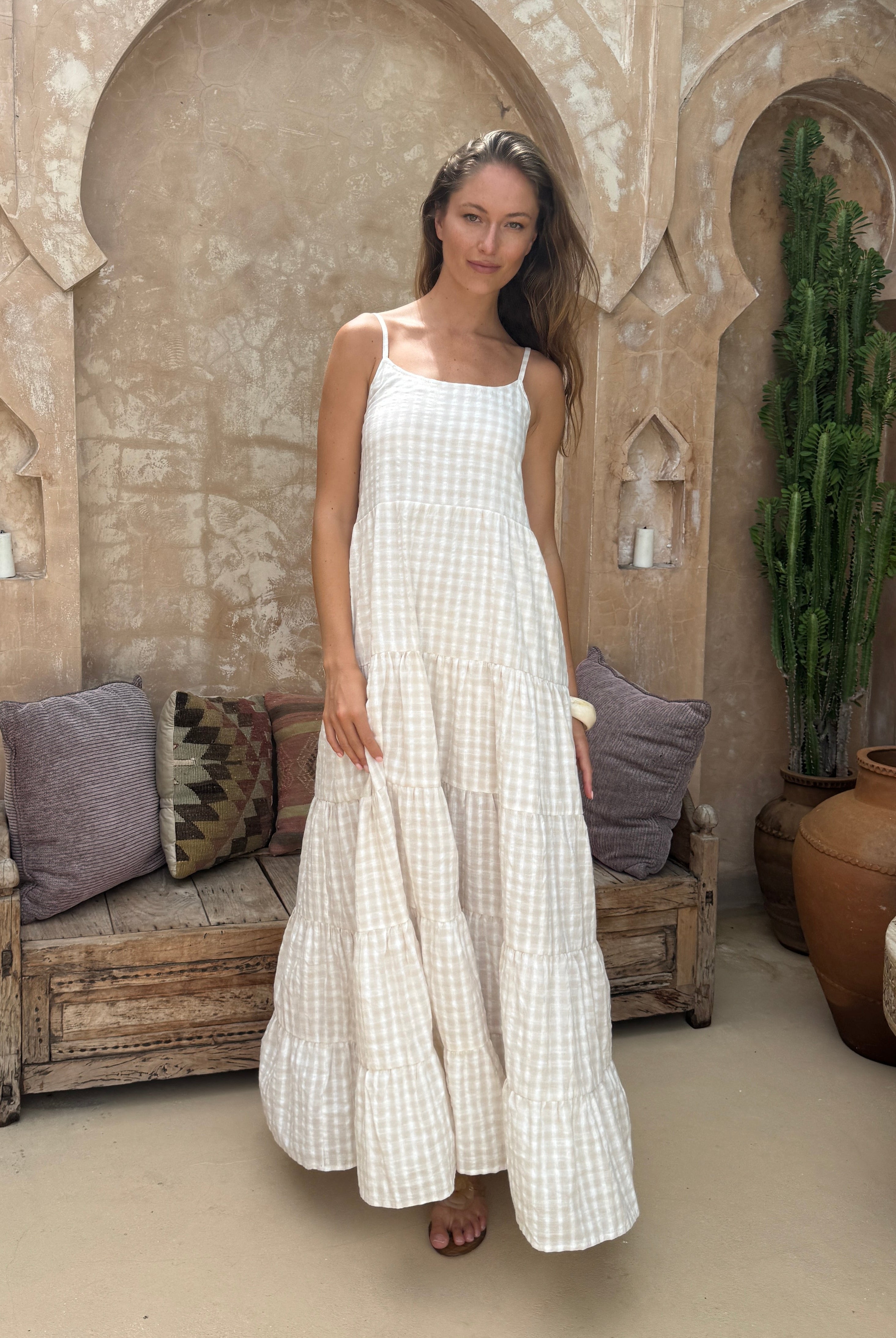 Beige check tiered cotton maxi dress quiet luxury summer outfit 2026, flowy neutral Waverly Dress for vineyard weekend and coastal occasion Puka The Label
