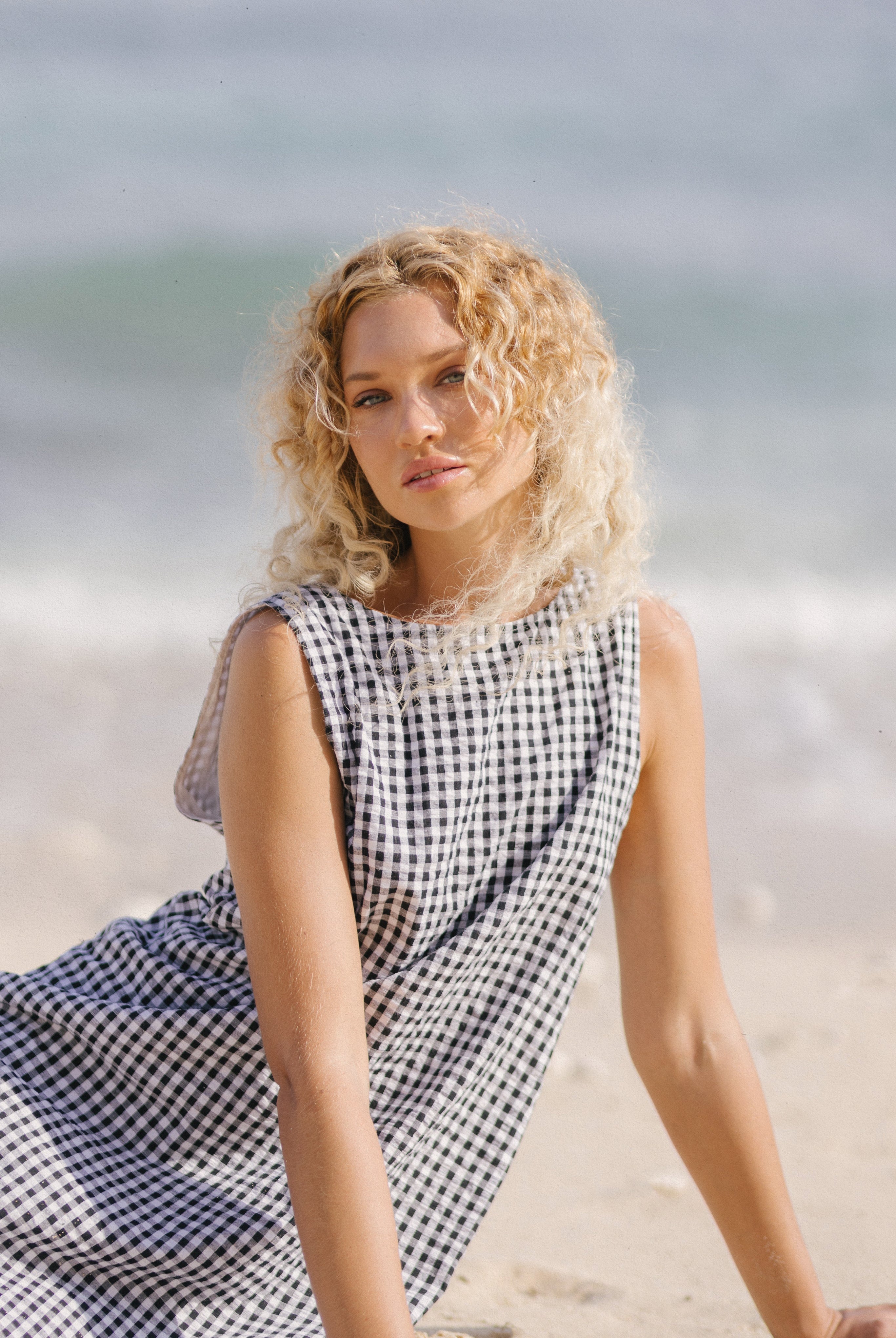 Back view of the black gingham Gili - breathable cotton maxi dress for petite women, effortlessly chic for Charleston weekends and coastal getaways
