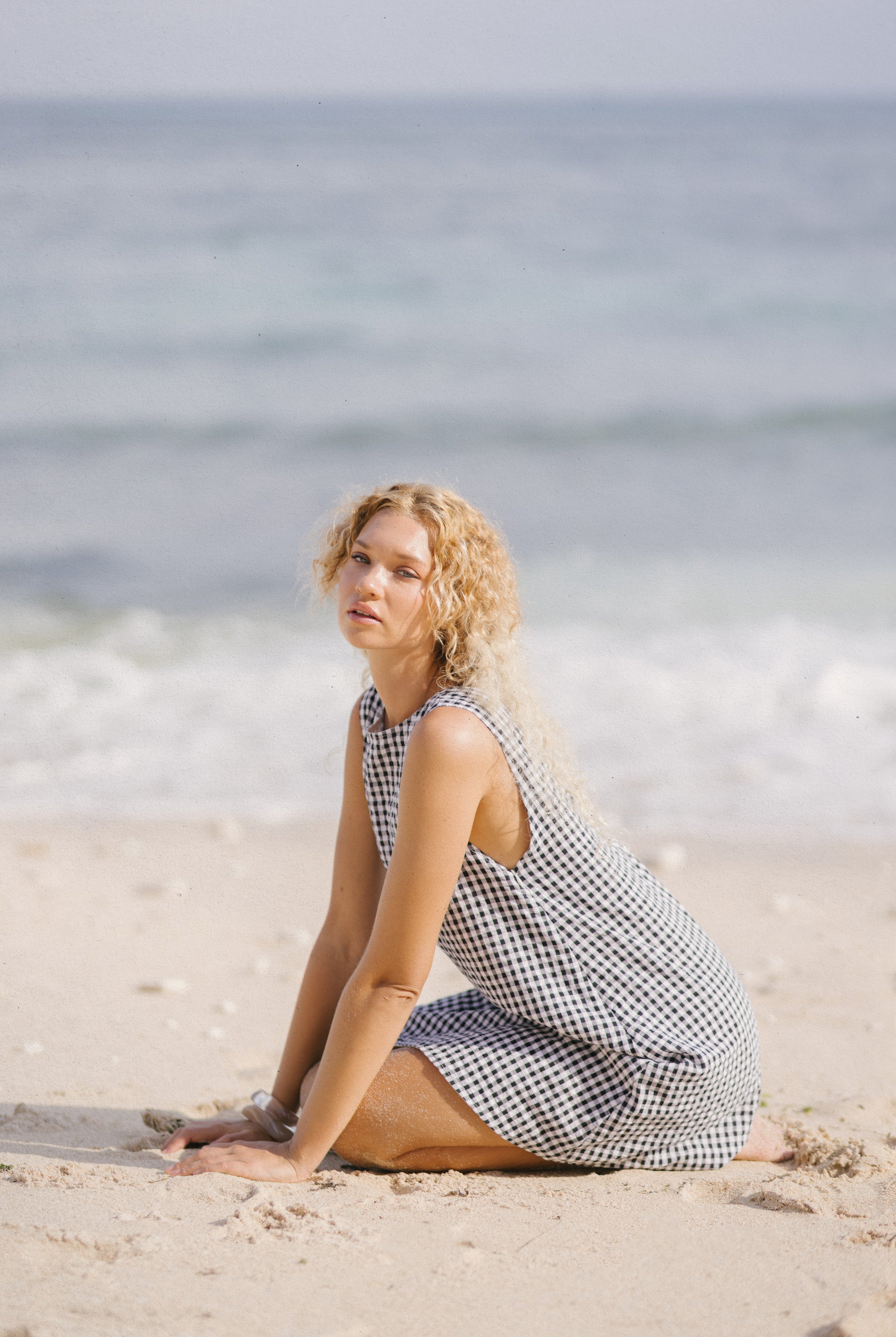 Black gingham mini Gili dress β versatile summer concert and festival outfit, from casual days to coastal chic