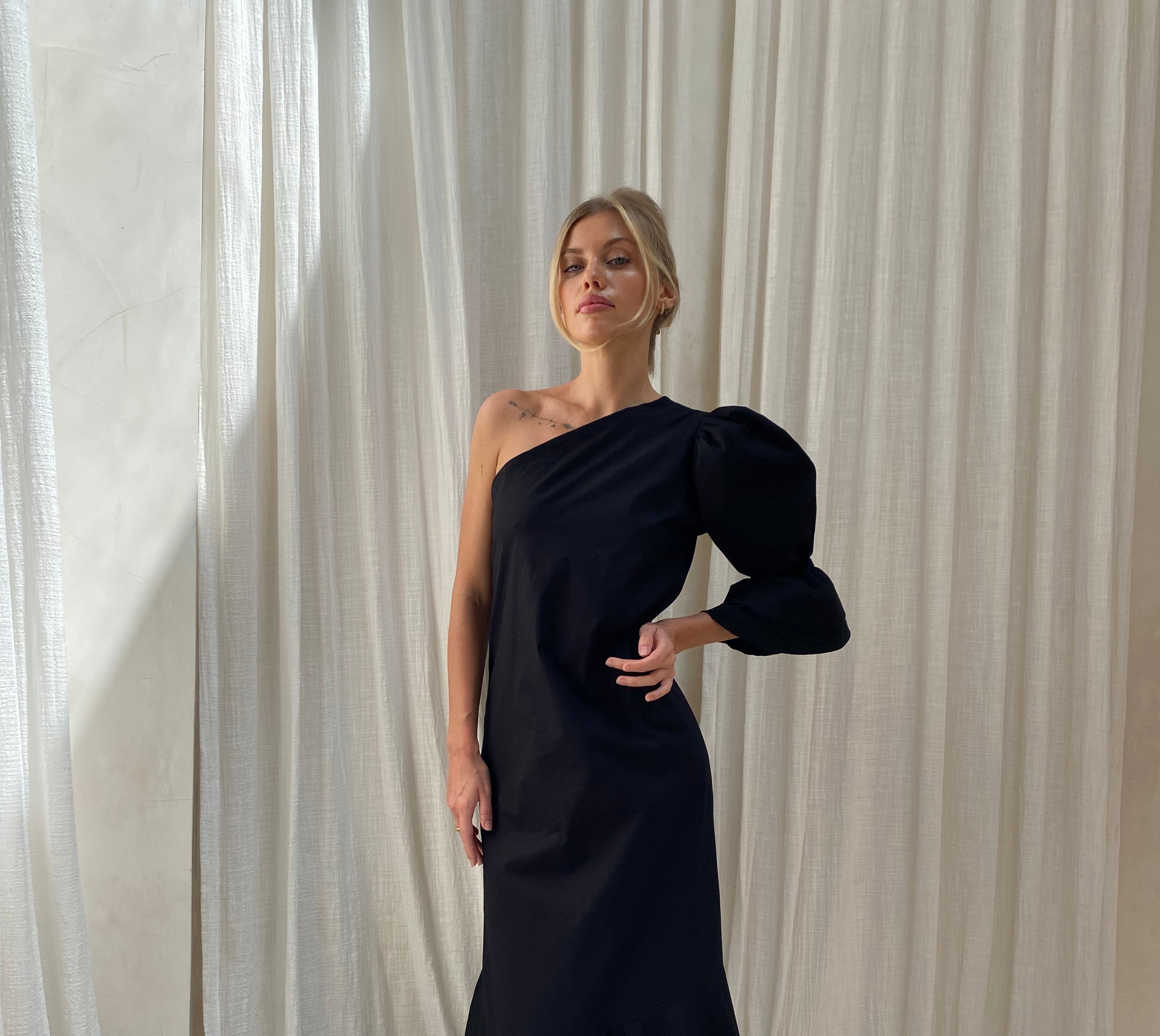 Chic black maxi dress holiday party and rehearsal dinner outfit idea, sophisticated one shoulder ruffle maxi 2026
