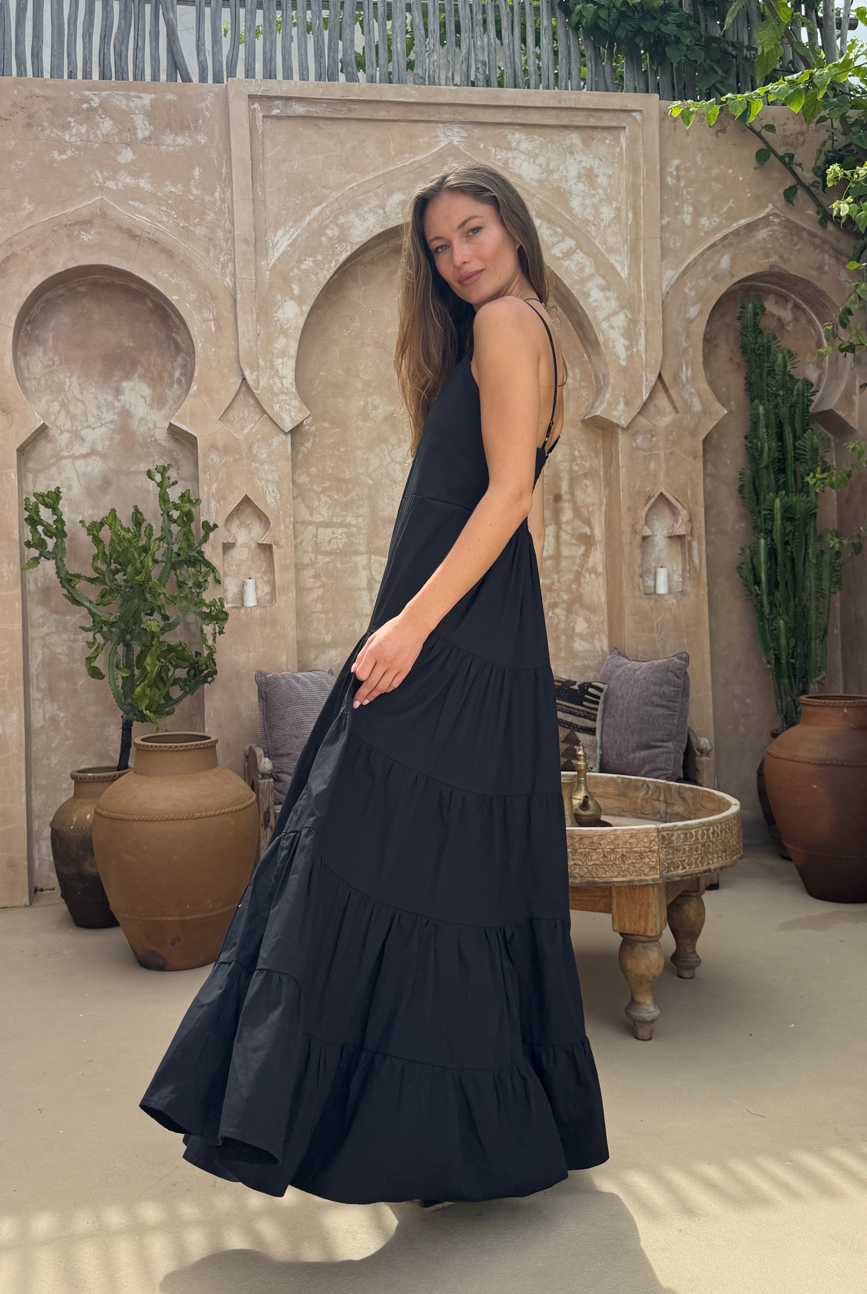 Black tiered cotton Waverly Dress Nantucket coastal evening outfit summer 2026, flowy adjustable strap maxi dress for East Coast summer occasion