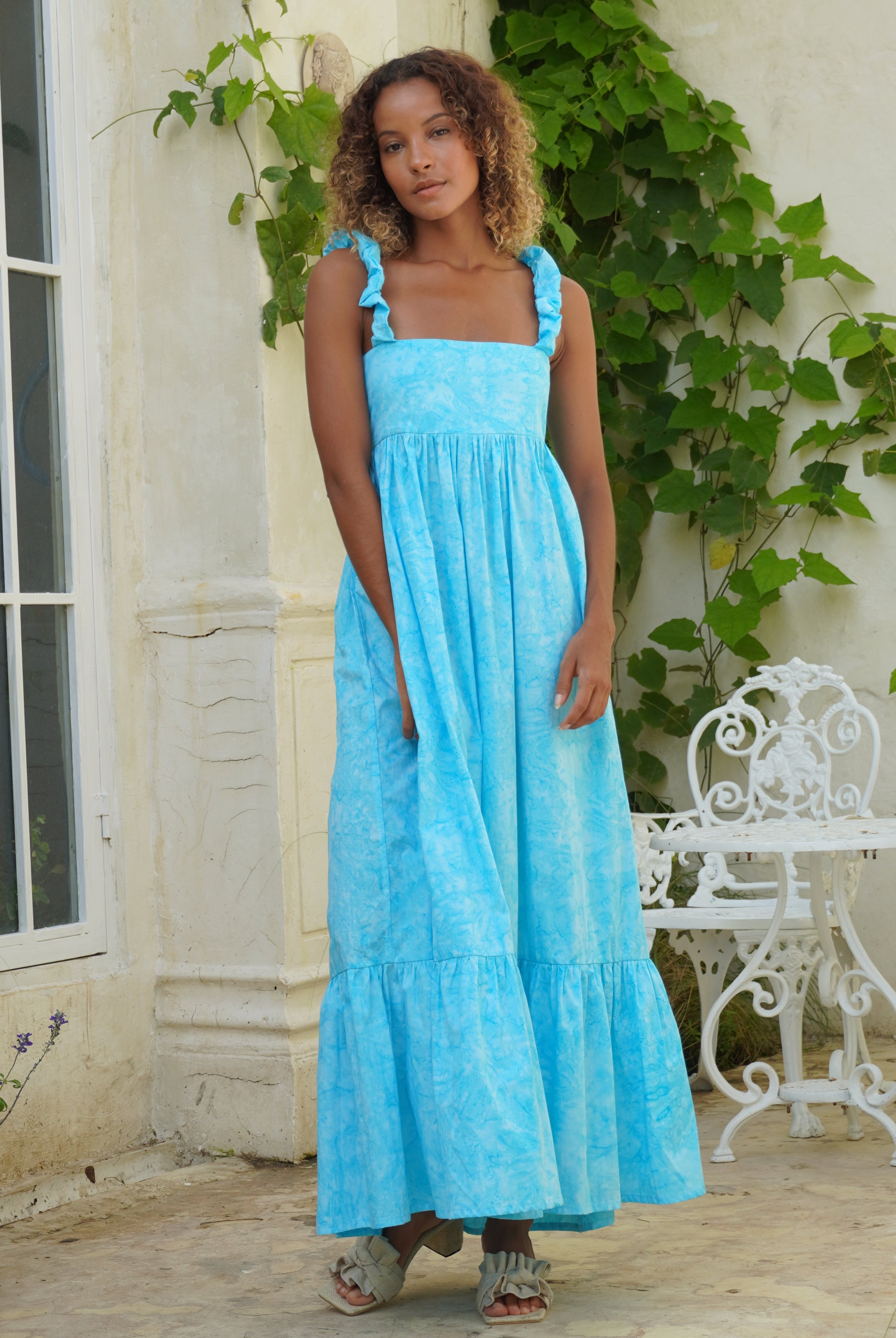 Aqua Bonito cotton ruffle dress detail — voluminous skirt in motion, lightweight hand-dyed cotton, easy beach vacation outfit
