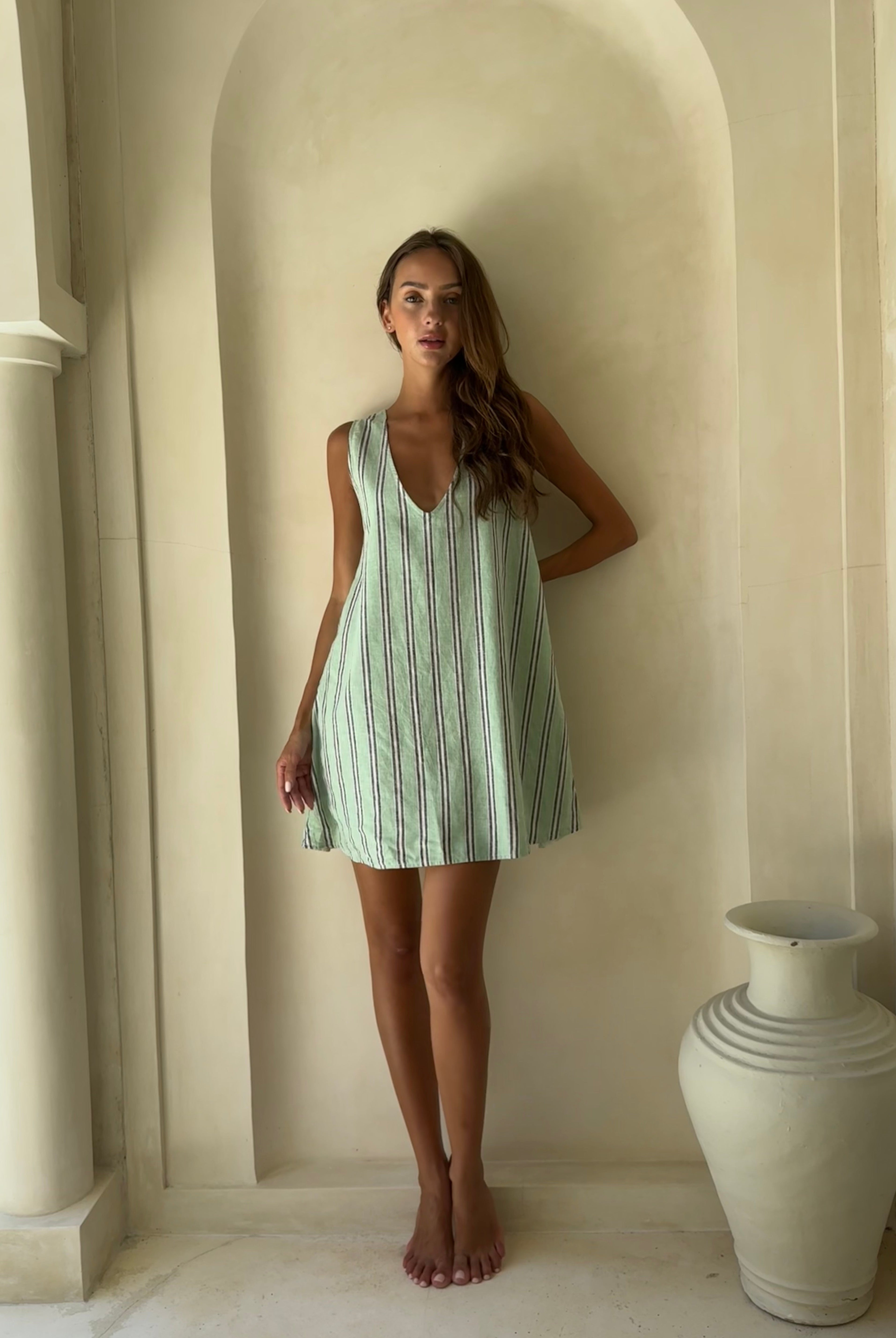 Bright aquamarine green stripe preppy mini dress Hamptons and Cape Cod summer outfit 2026, vibrant beach inspired hemp cotton dress for coastal club occasion