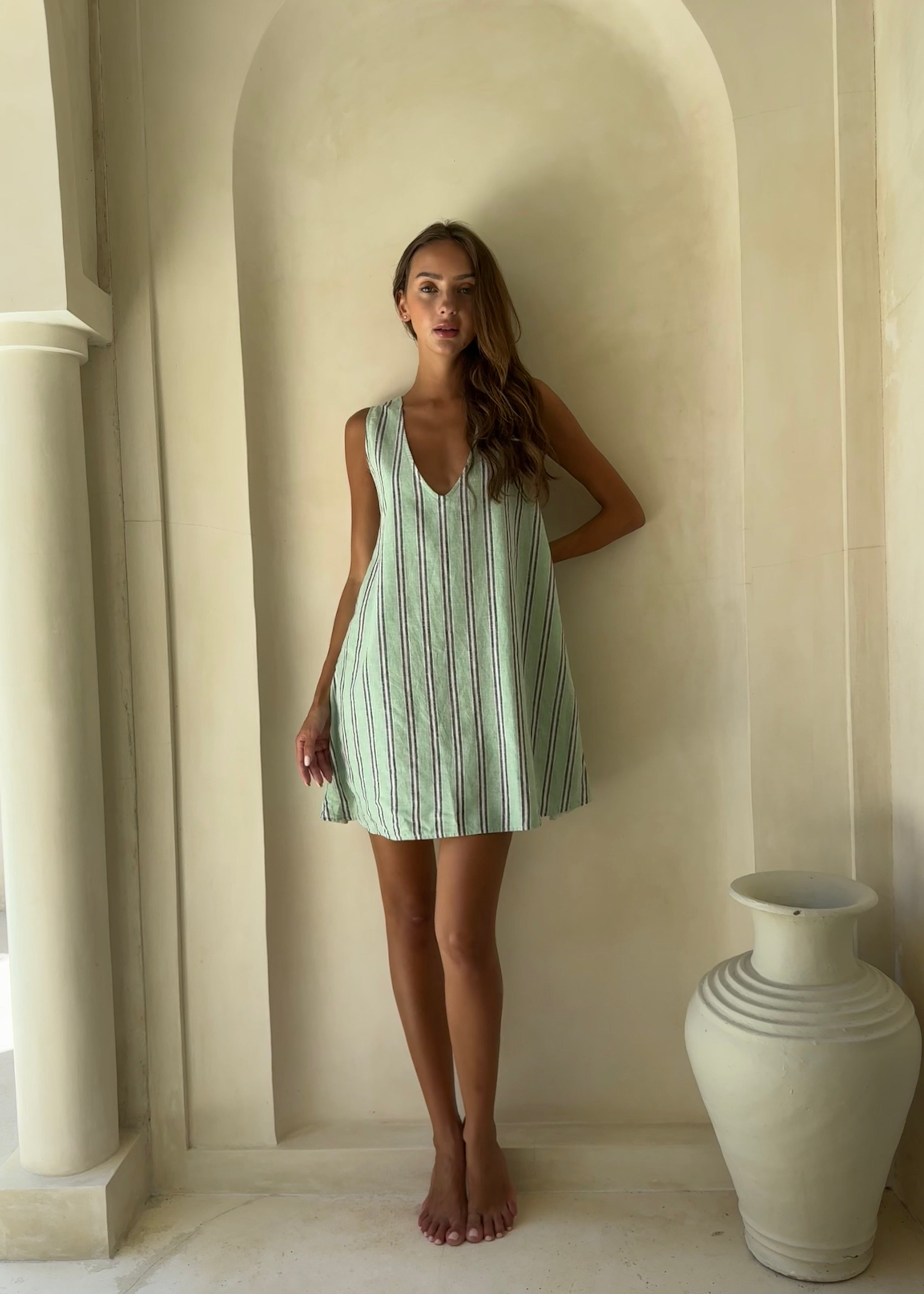 Bright aquamarine green stripe preppy mini dress Hamptons and Cape Cod summer outfit 2026, vibrant beach inspired hemp cotton dress for coastal club occasion