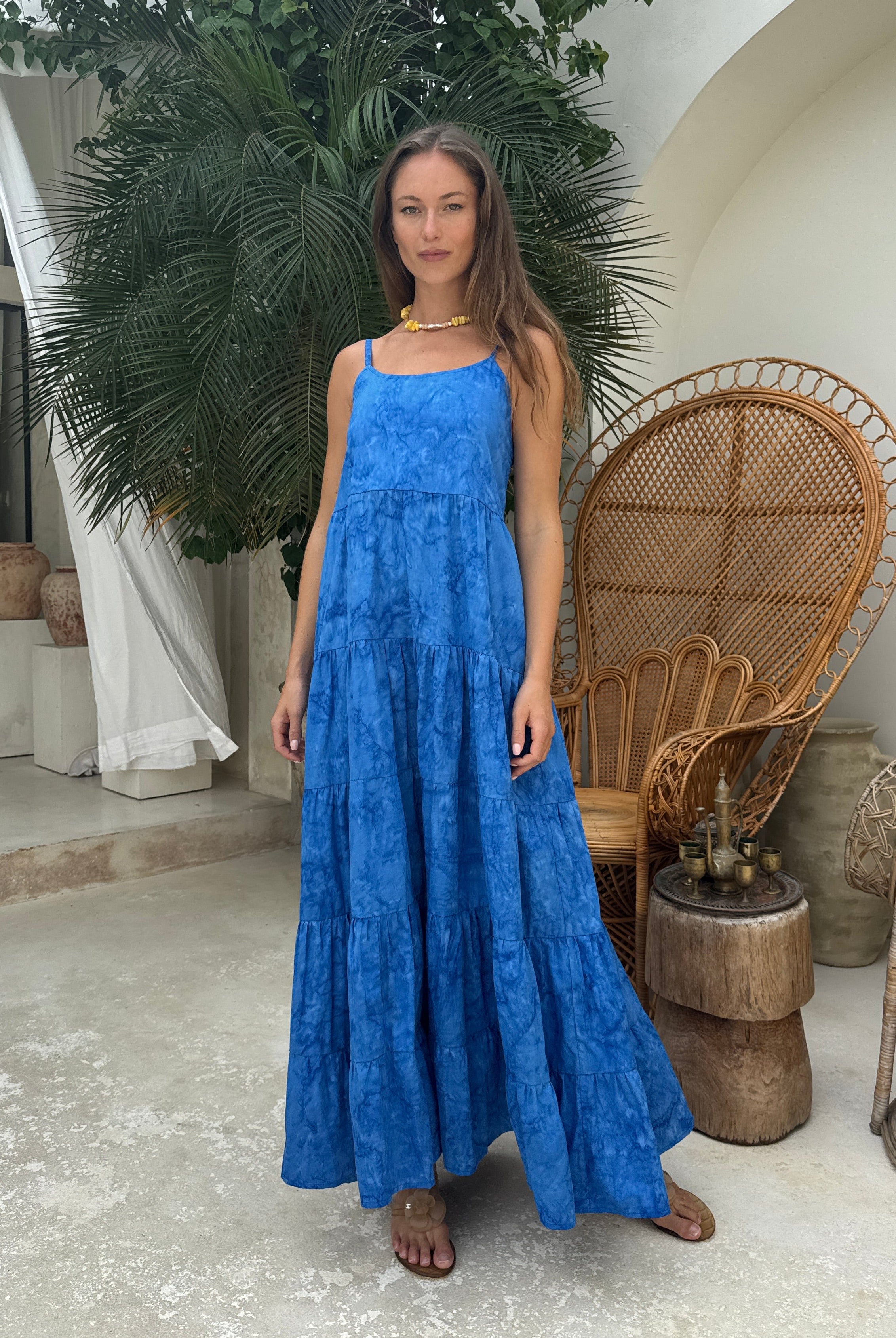 Cobalt blue flowy tiered maxi dress Nantucket and Hamptons summer outfit 2026, vibrant hand-dyed cotton dress for East Coast coastal celebration