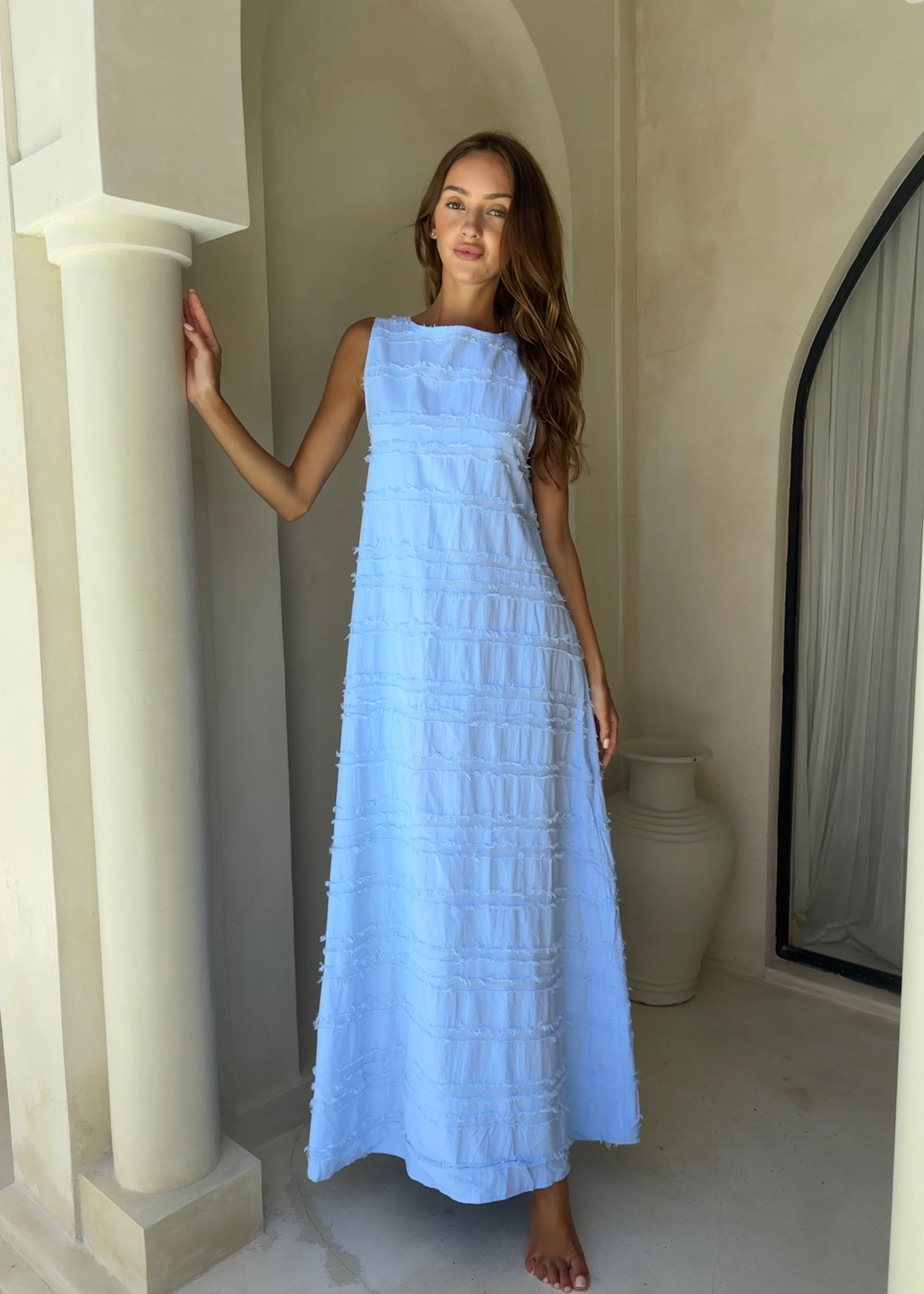 Couper x Puka Exclusive Gili Dress light blue feathered cotton maxi high neck, Santorini Mediterranean resort summer 2026 dress Puka The Label