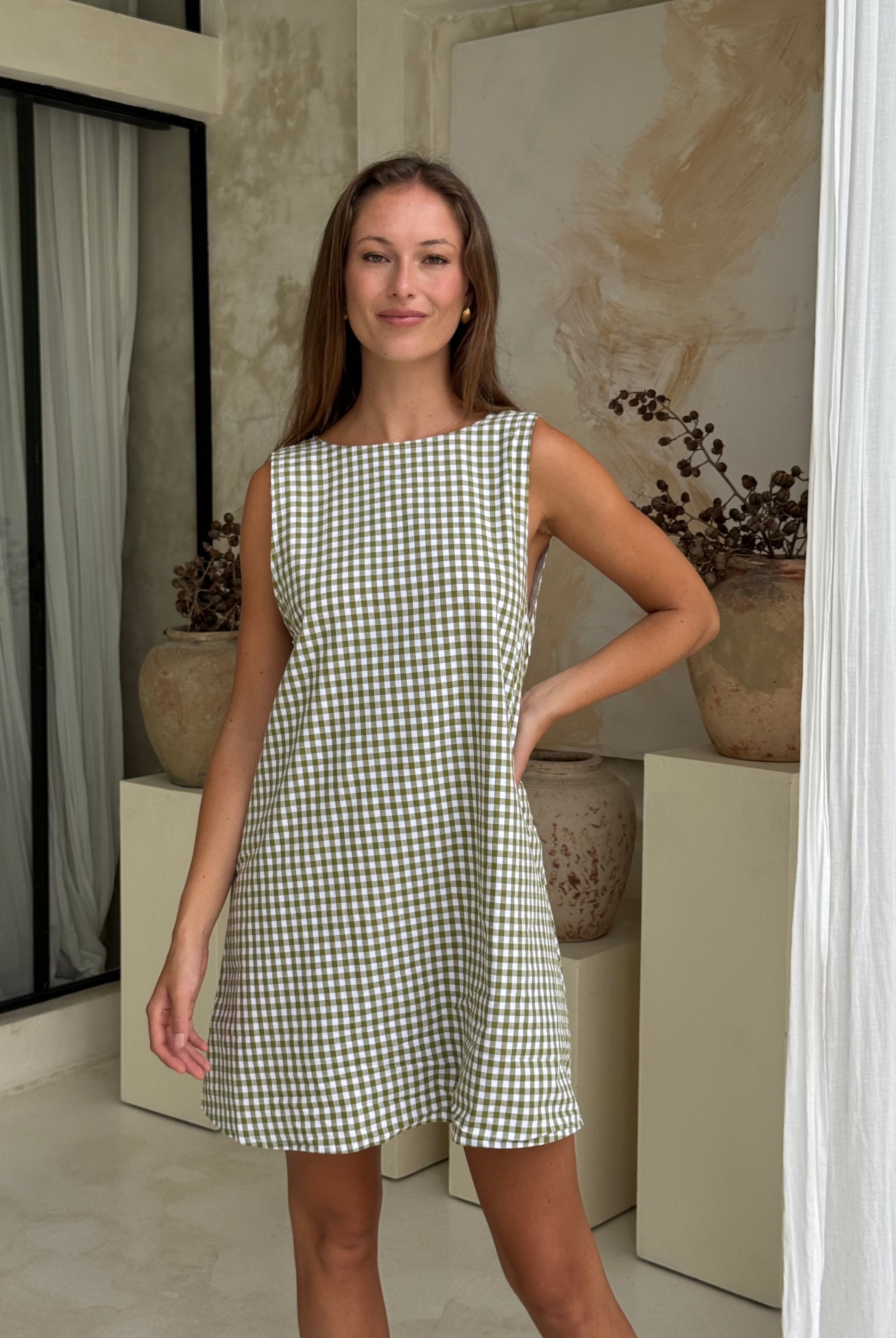Green gingham mini Gili dress β a fresh, effortless picnic and spring date outfit by Puka The Label