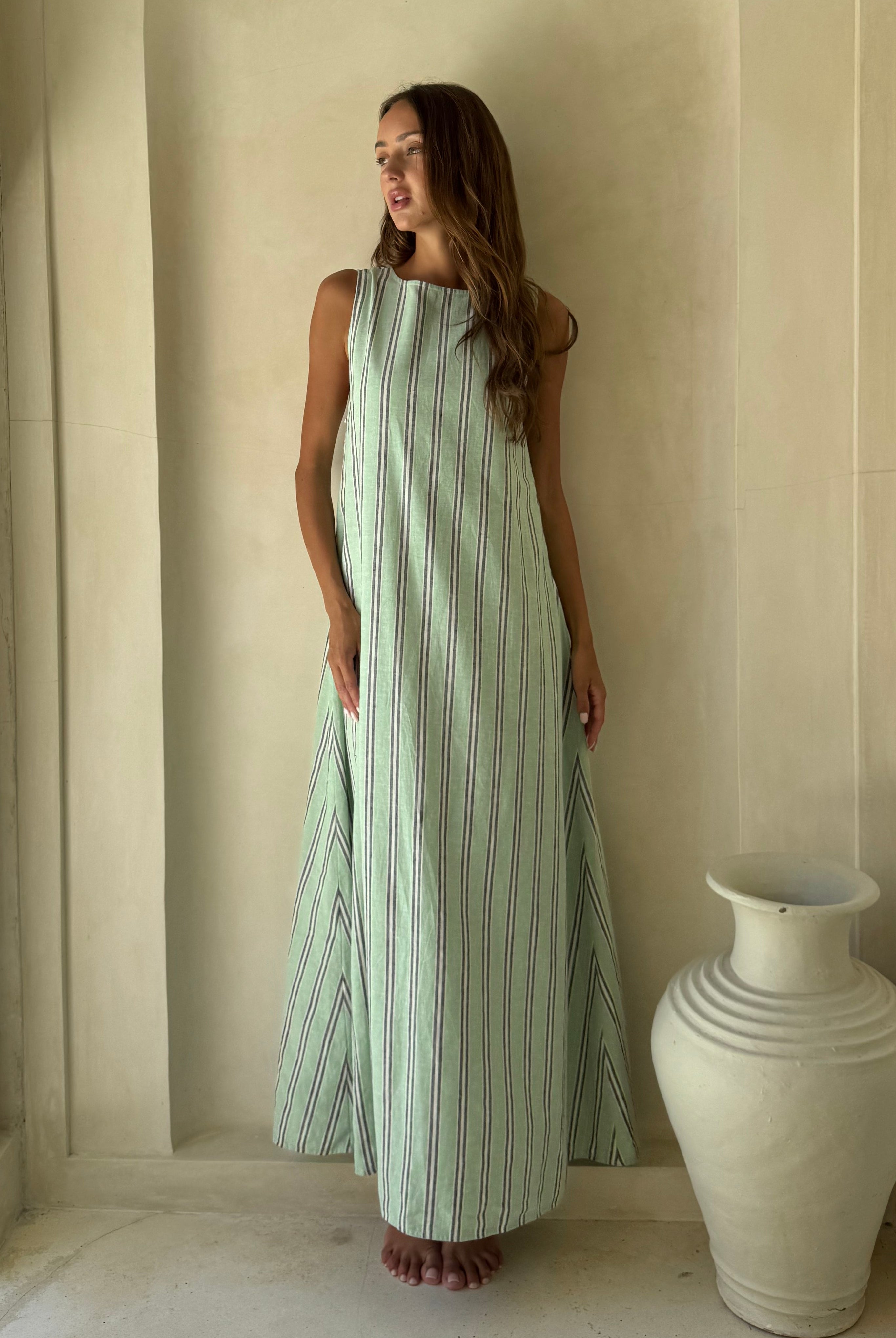 Gili Green Navy and White Stripe Maxi Dress as a resort wear staple, versatile convertible neckline for beach to sunset
