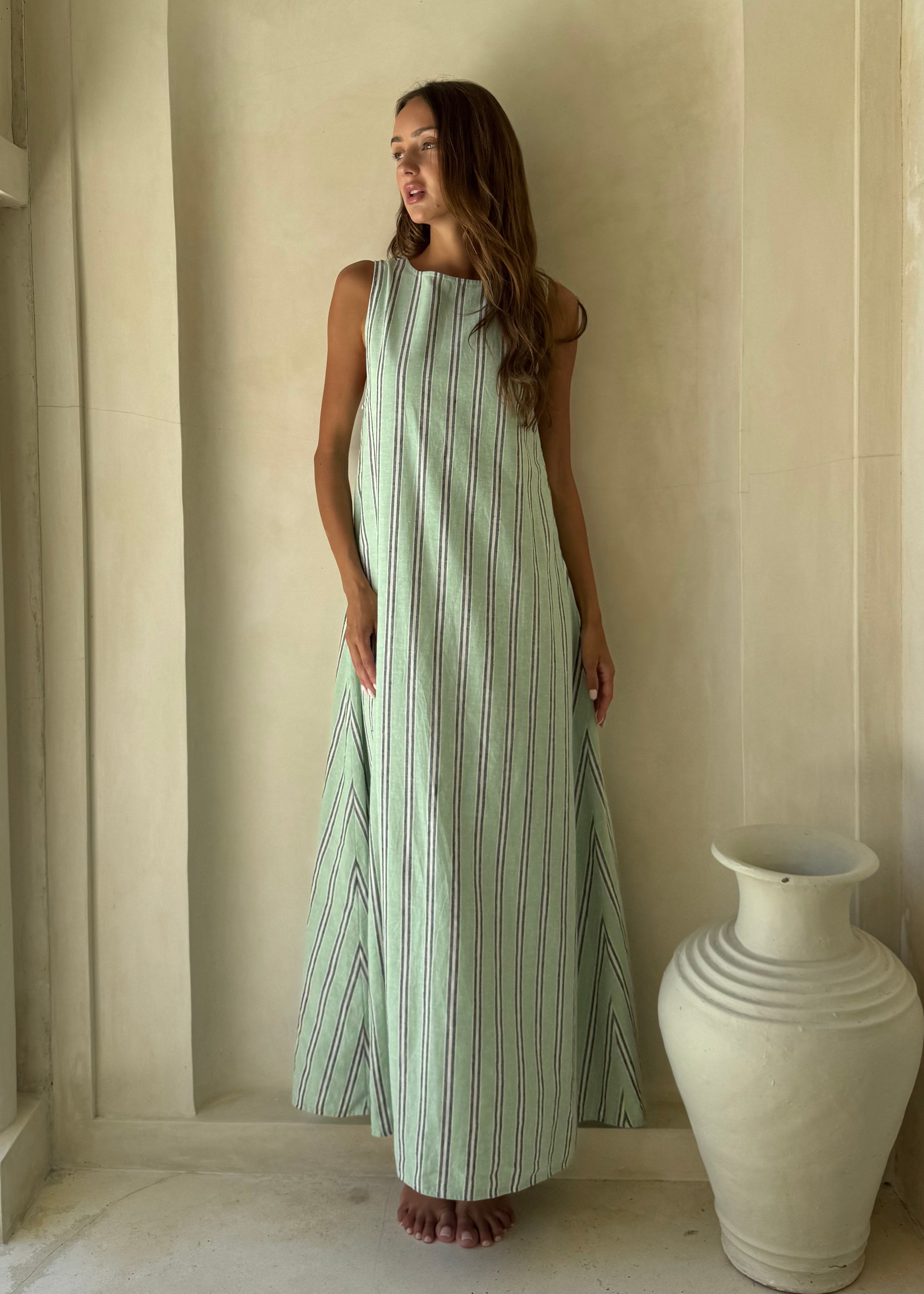 Gili Green Navy and White Stripe Maxi Dress as a resort wear staple, versatile convertible neckline for beach to sunset