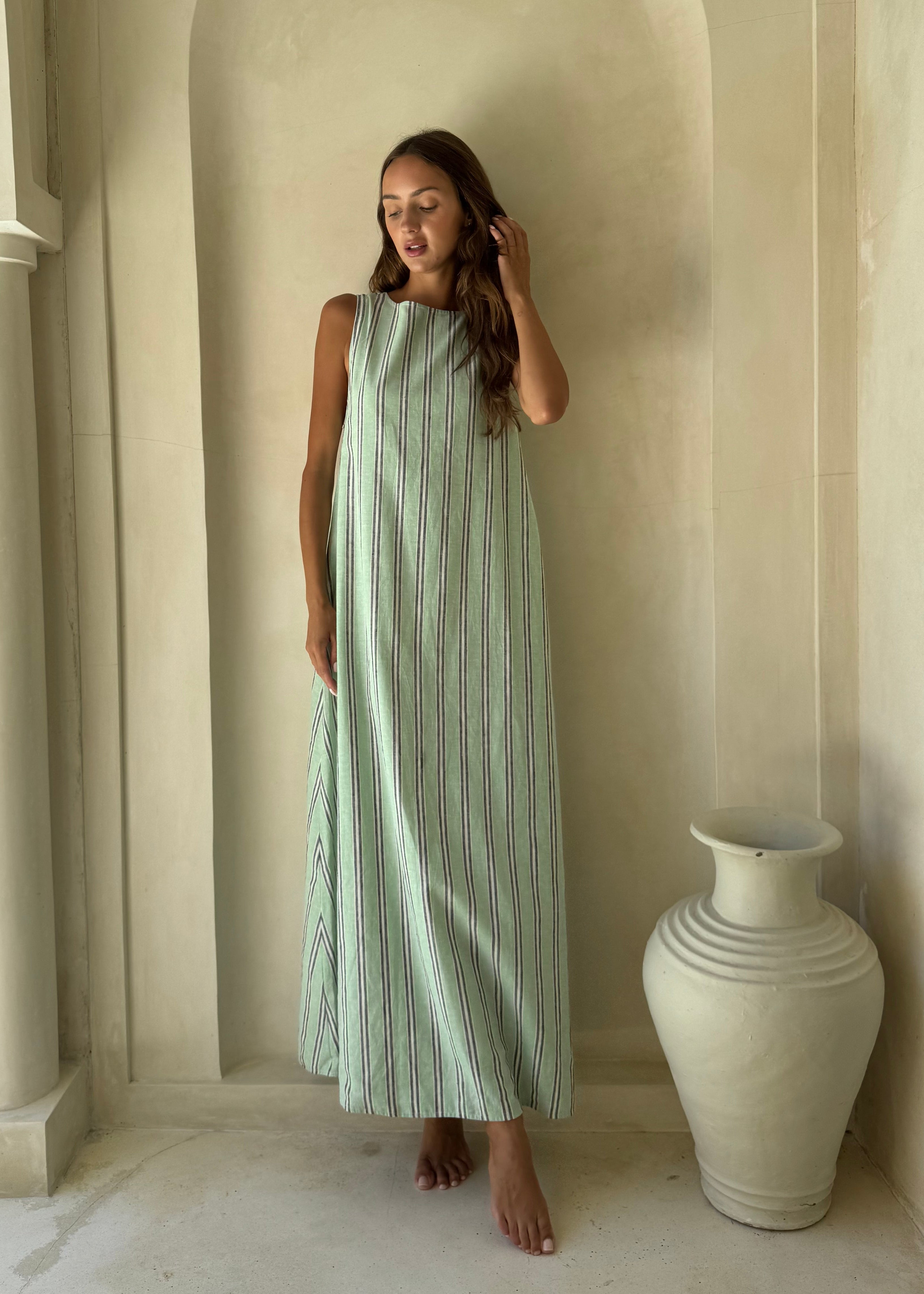 Gili Green Navy and White Stripe Maxi Dress styled as a chic beach coverup for a European summer vacation