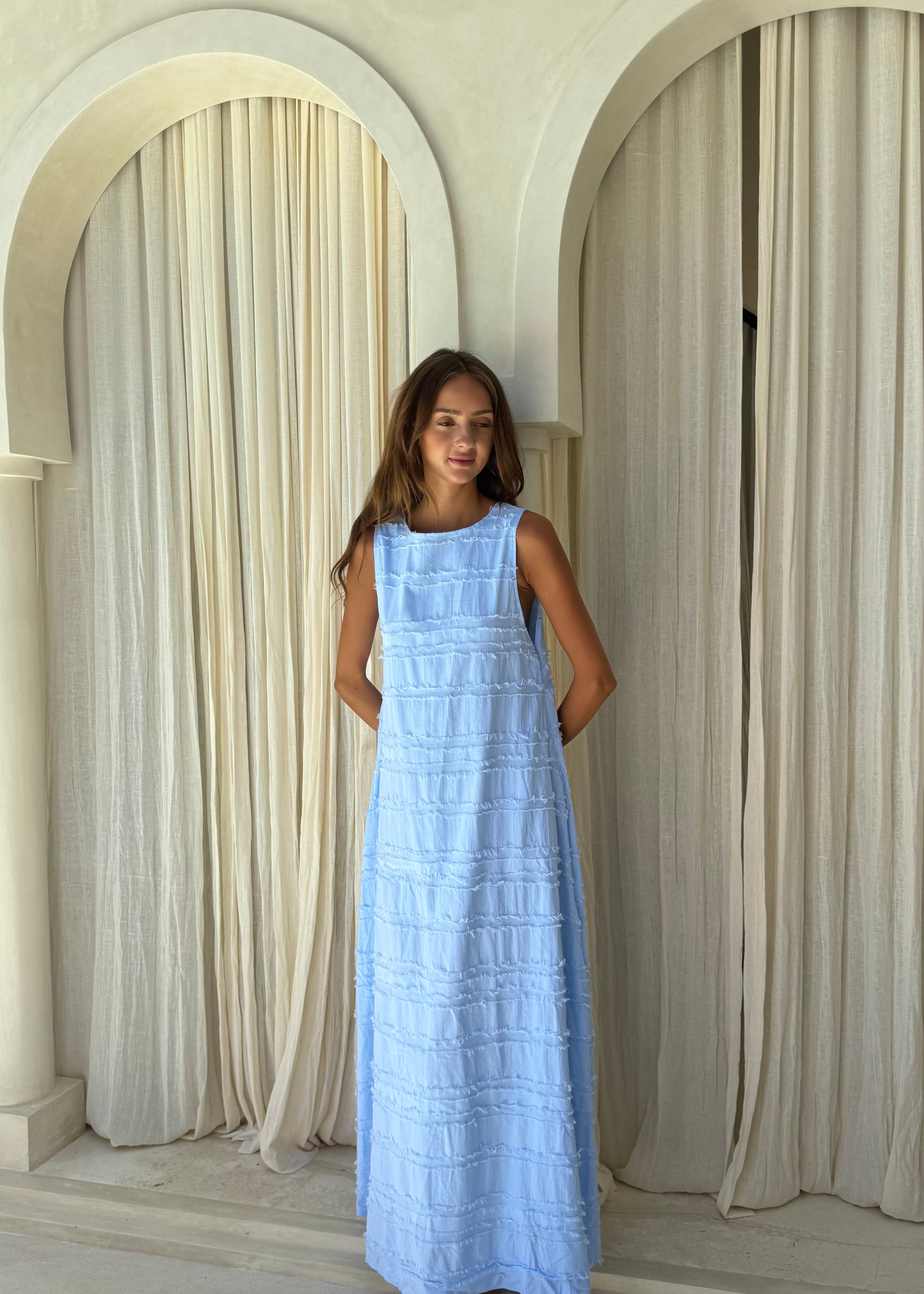 Light blue Couper x Puka Exclusive Gili maxi dress Cape Cod summer outfit 2026, effortless easy to wear vibrant textured cotton maxi Puka The Label