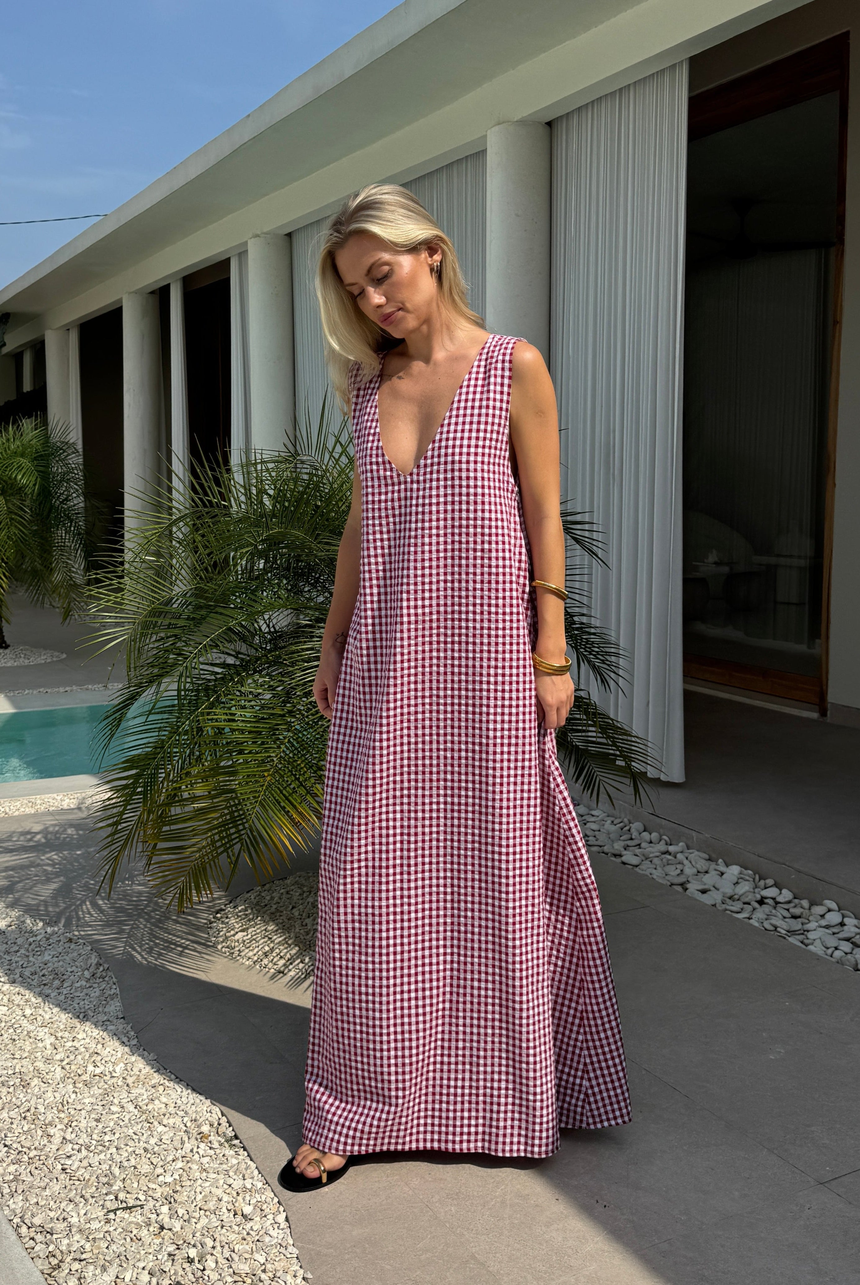 Maroon gingham Gili maxi dress as outdoor wedding guest and summer formal occasion outfit, Puka The Label