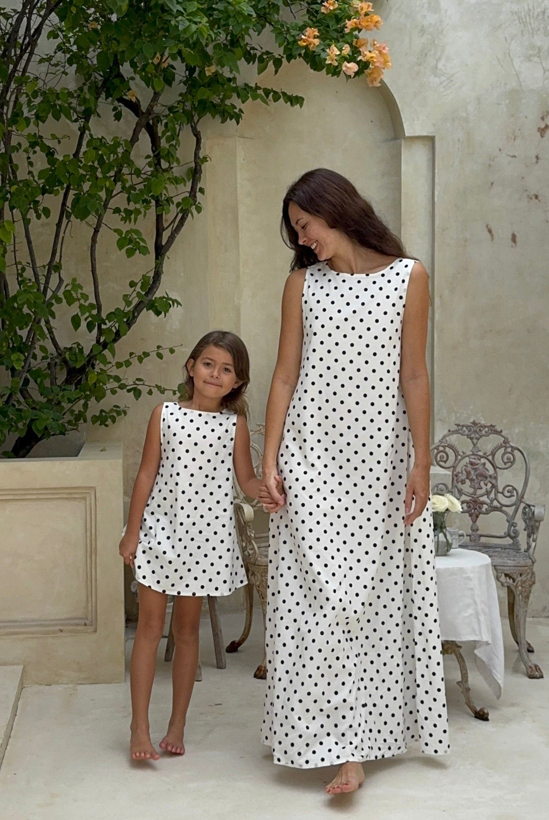 Matching mother daughter polka dot dresses — black and white cotton mini dress for girls paired with adult maxi