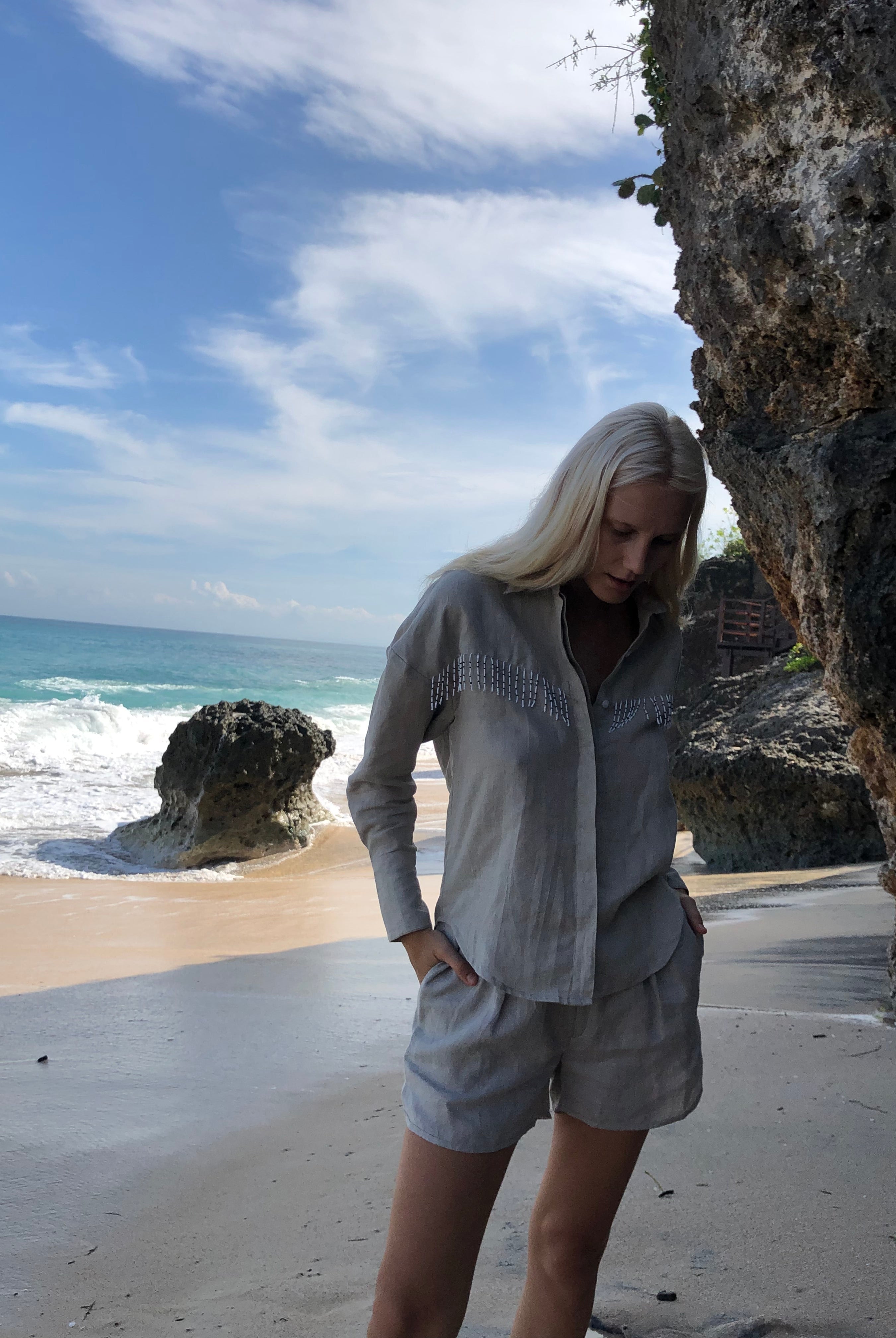 Natural linen fringe blouse from Puka The Label — an elevated western button-up with black and white fringe for fall occasions