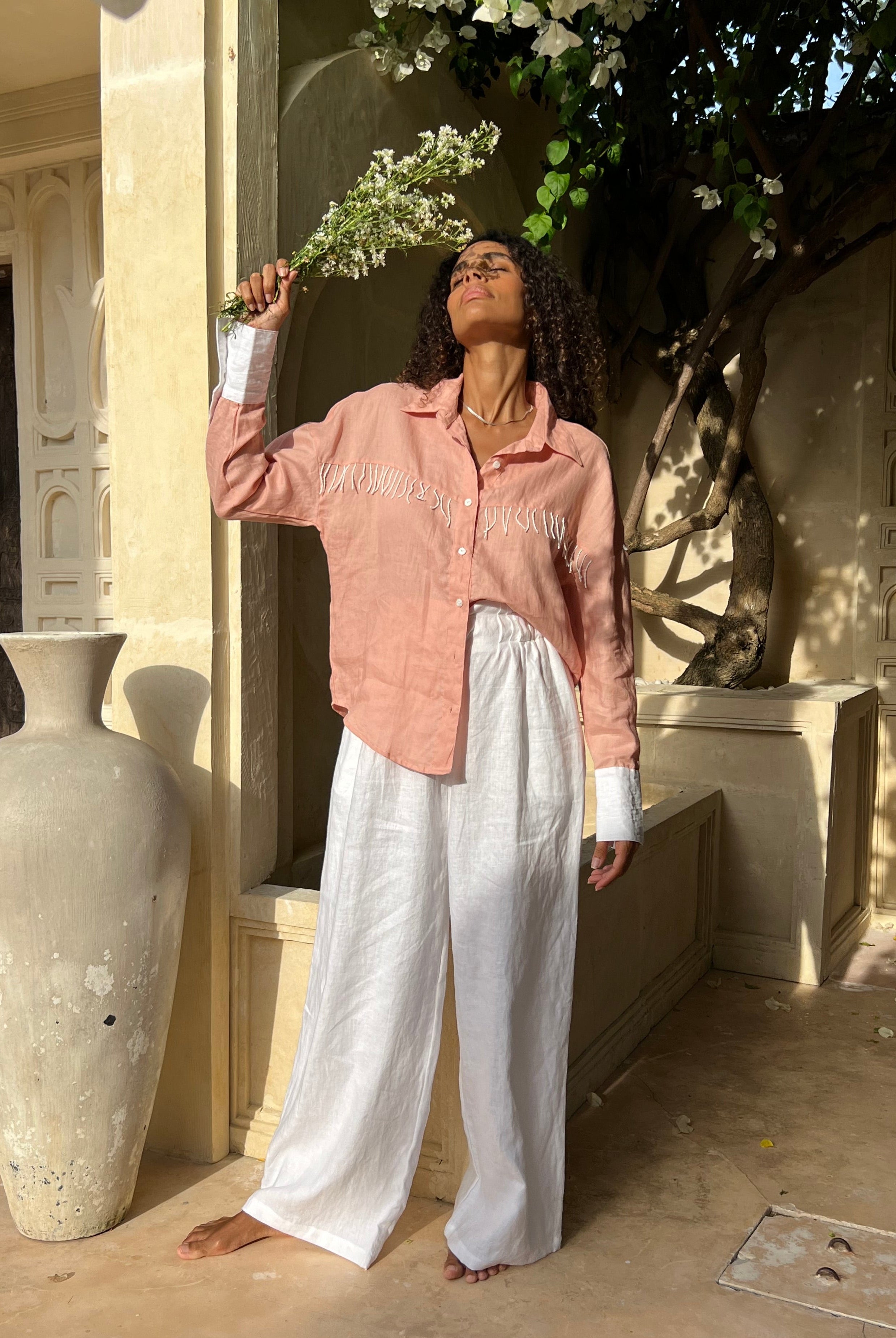 Puka The Label peach Ulu fringe top styled ranch-to-resort — a versatile western button-up blouse for spring and travel
