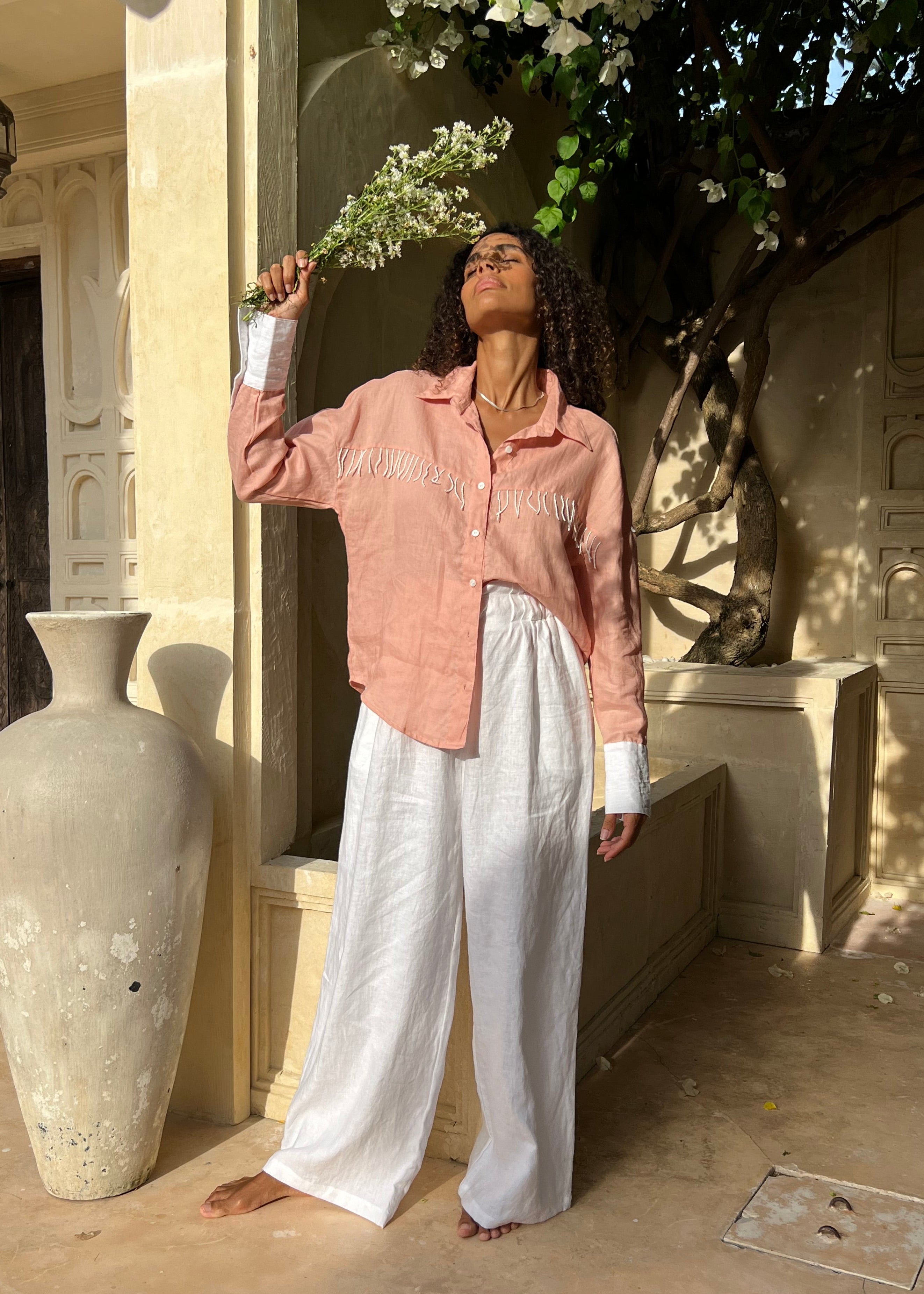 Puka The Label peach Ulu fringe top styled ranch-to-resort — a versatile western button-up blouse for spring and travel