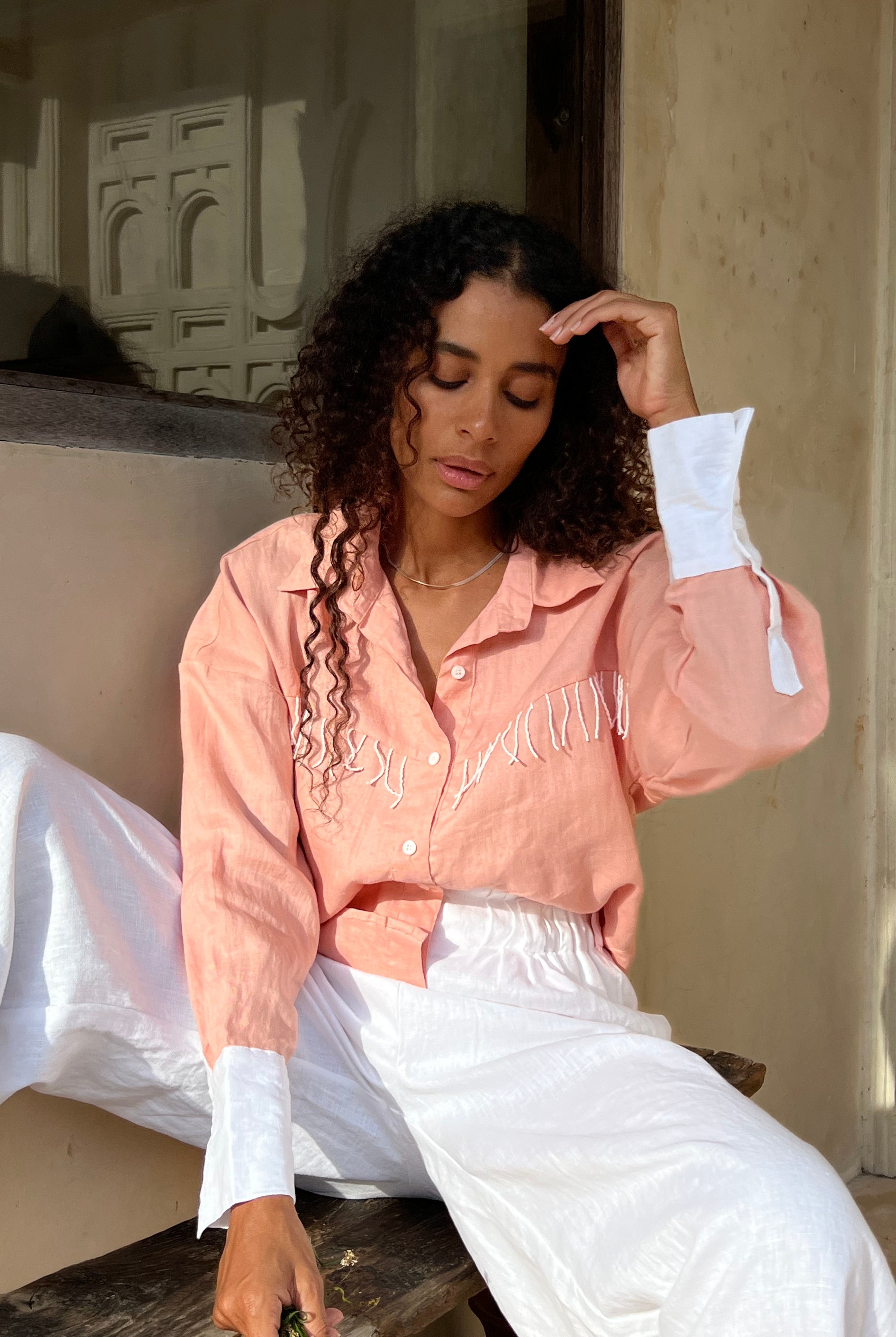 Puka The Label peach Ulu fringe top styled ranch-to-resort — a versatile western button-up blouse for fall and travel