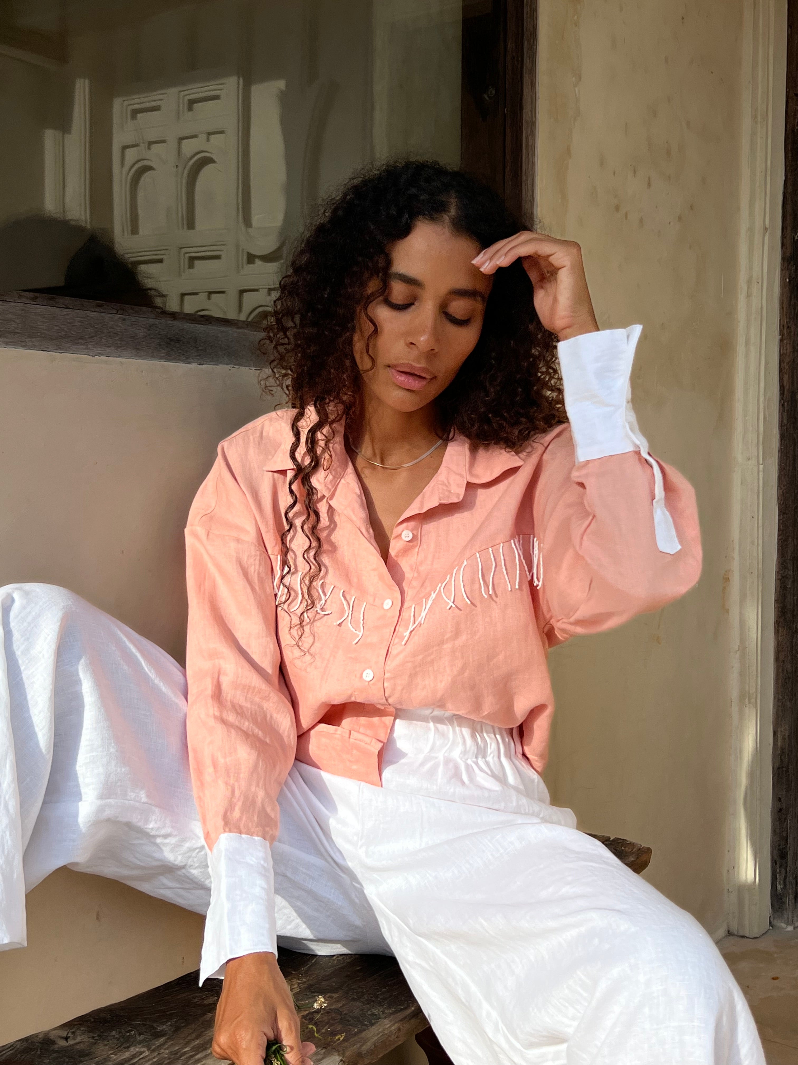 Puka The Label peach Ulu fringe top styled ranch-to-resort — a versatile western button-up blouse for fall and travel