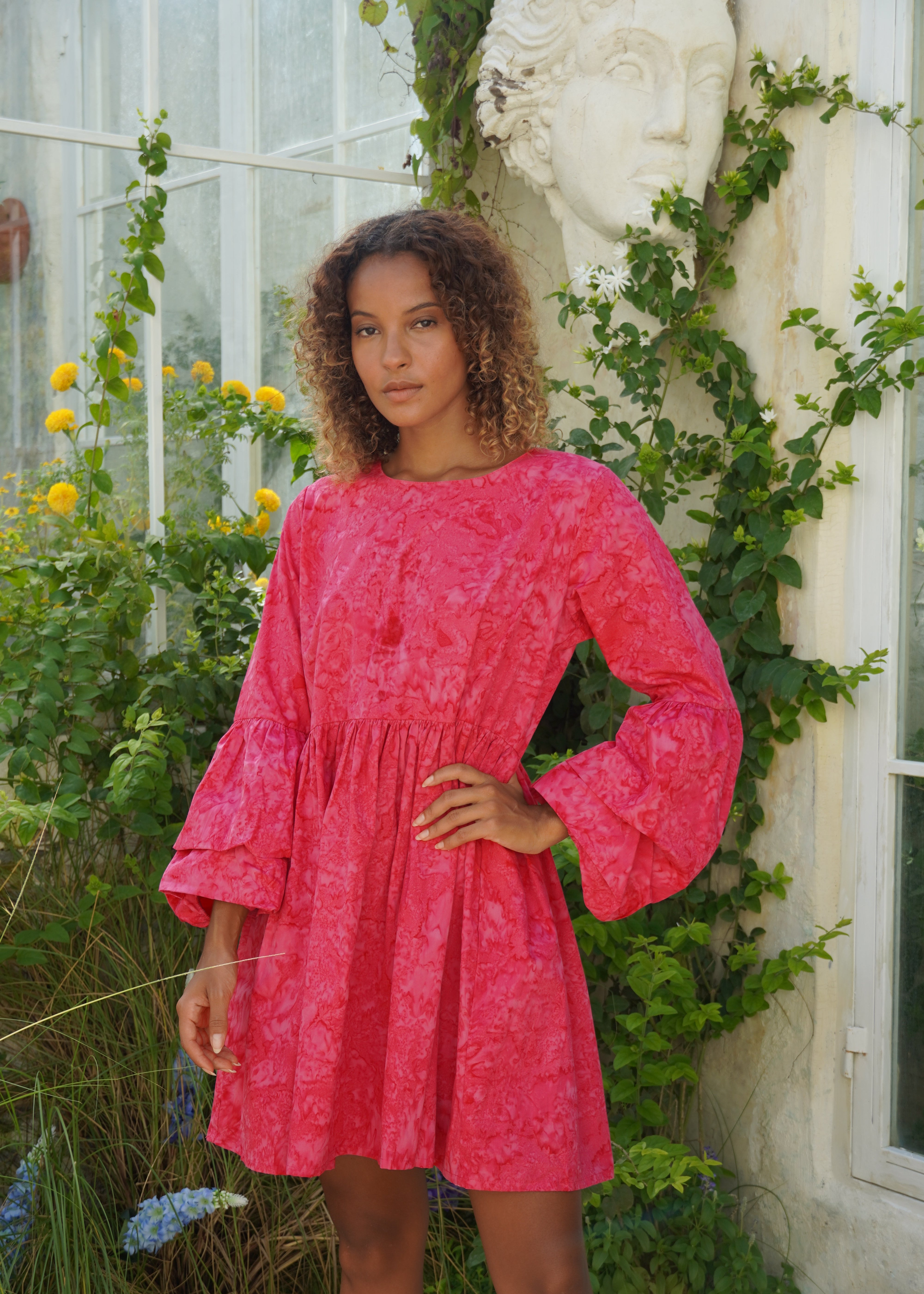 Pink hand-dyed Nori Dress Hamptons and Nantucket preppy summer outfit 2026, vibrant ruffle sleeve cotton mini dress for East Coast coastal occasion