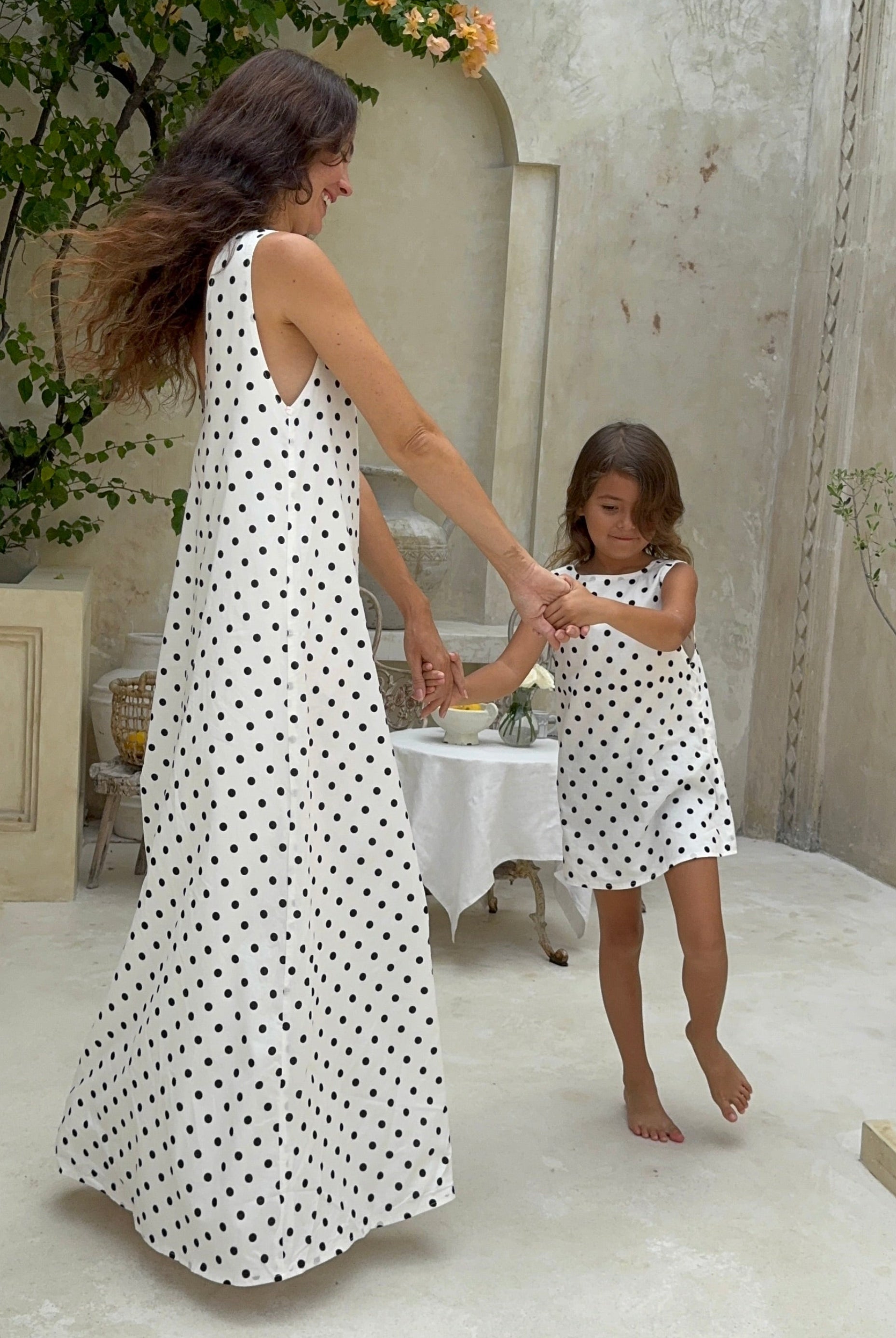 Polka dot mommy and me matching girls dress Mother's Day brunch outfit 2026, classic black and white toddler dress for spring celebration