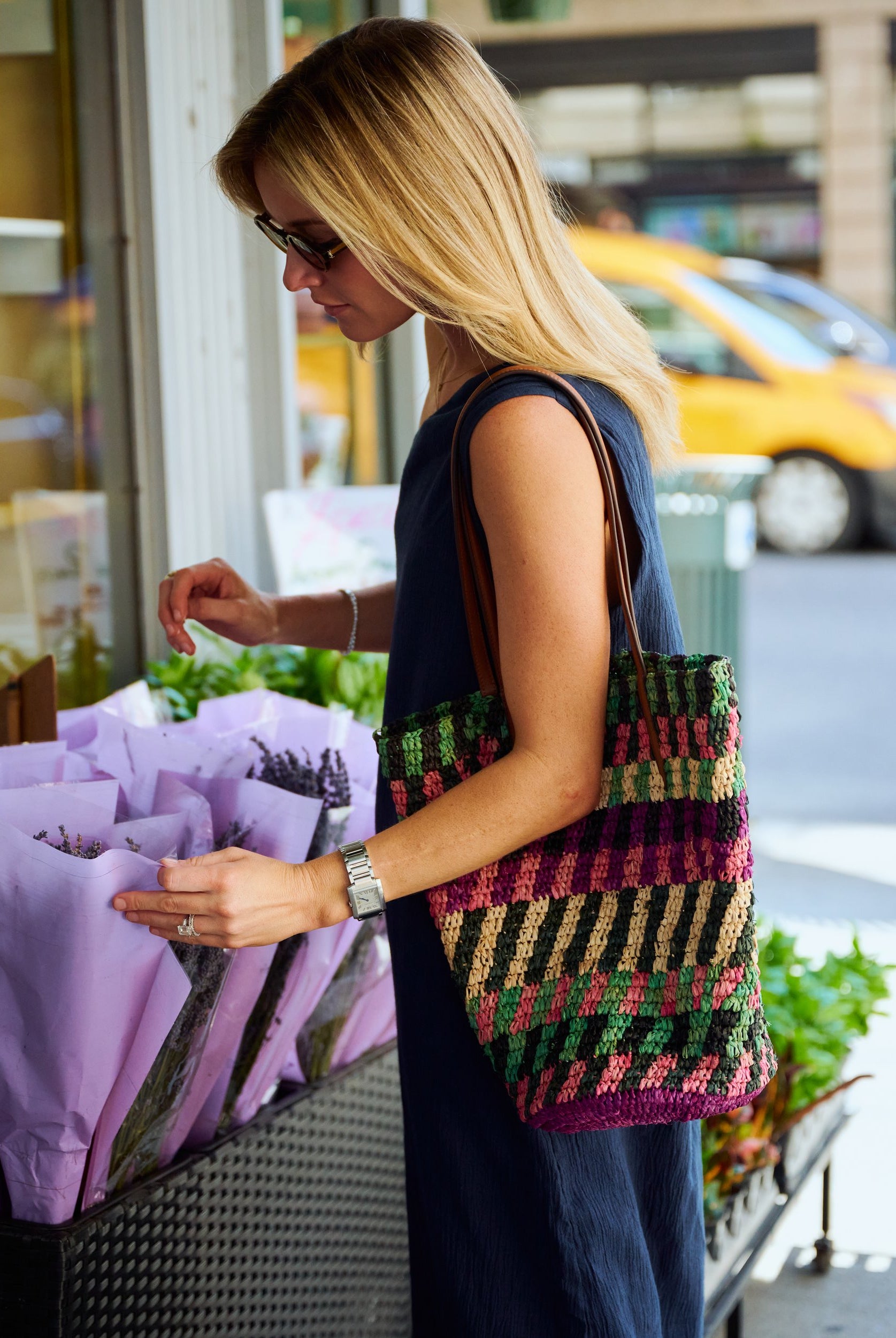 Natalie Simkins in the Camilla Dress Midnight navy maxi, floor-length silhouette, NYC florist