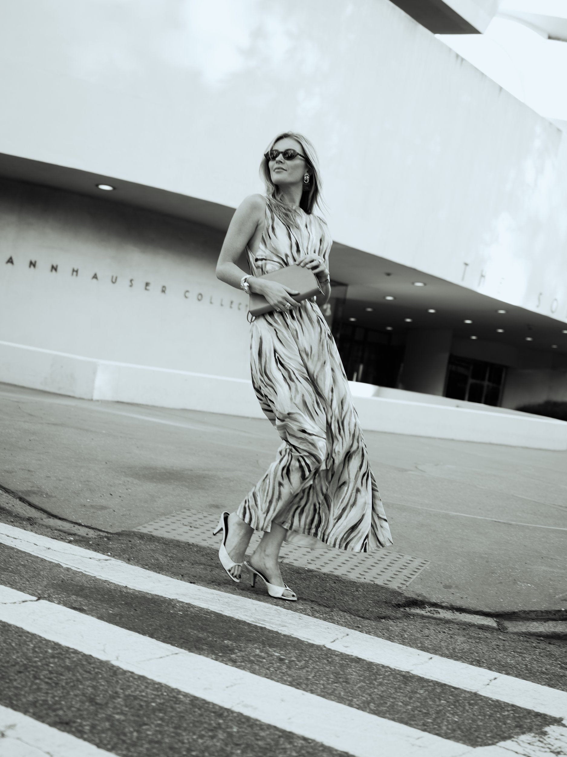 Natalie Simkins in the Puka x Natalie Simkins Cleo maxi dress in Brown Zebra print, NYC
