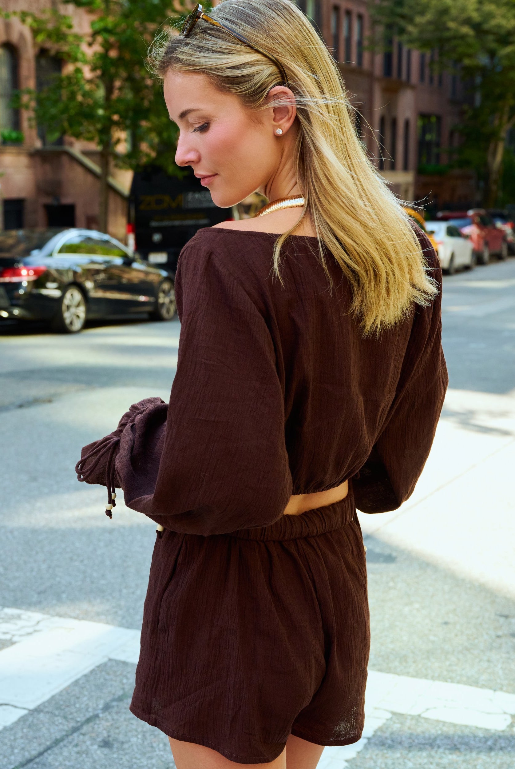 Puka Colette Set Espresso β Natalie Simkins, side view showing balloon sleeve volume and matching shorts