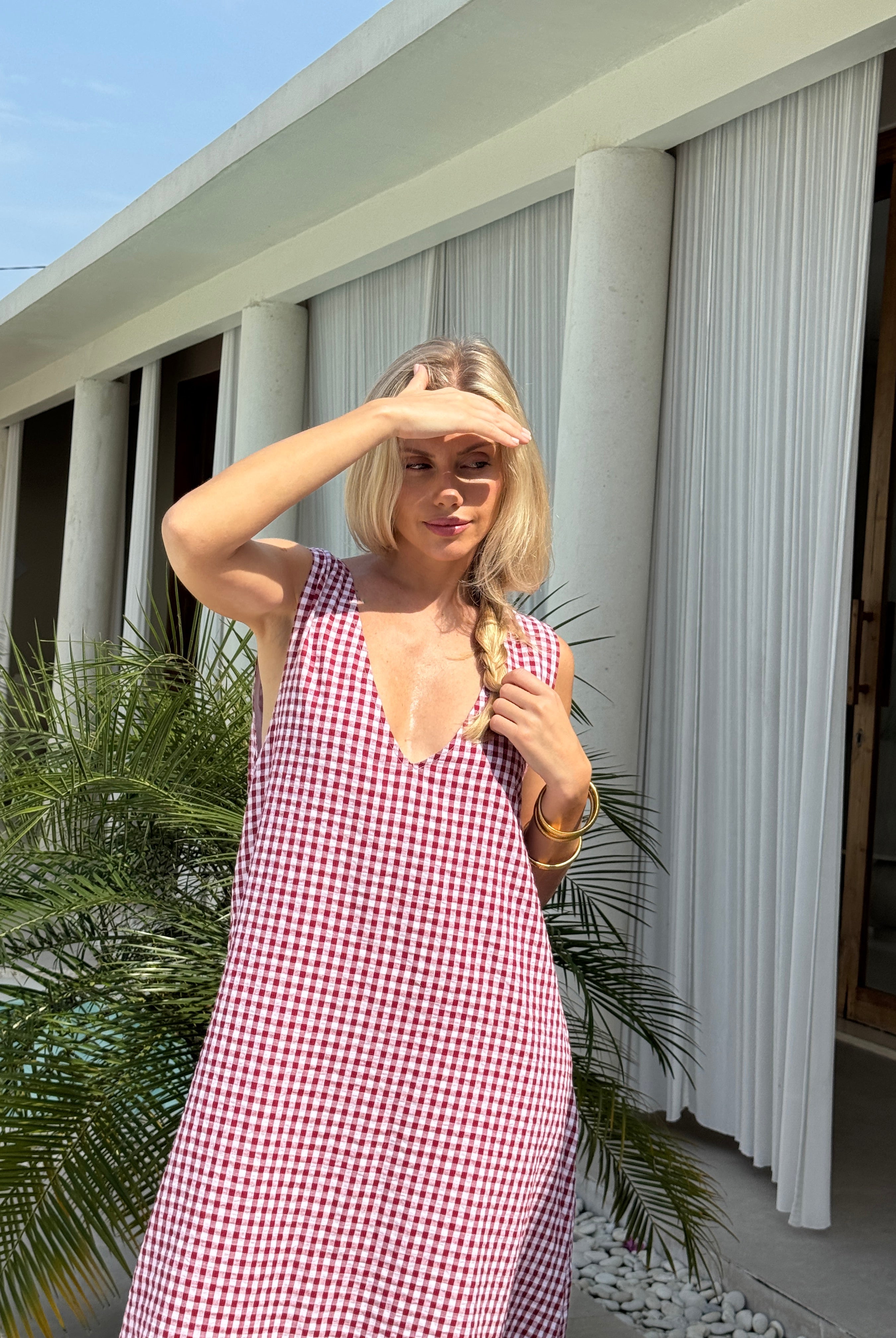 Red gingham Gili maxi styled for summer dinner and rooftop party β versatile cotton maxi, Puka The Label