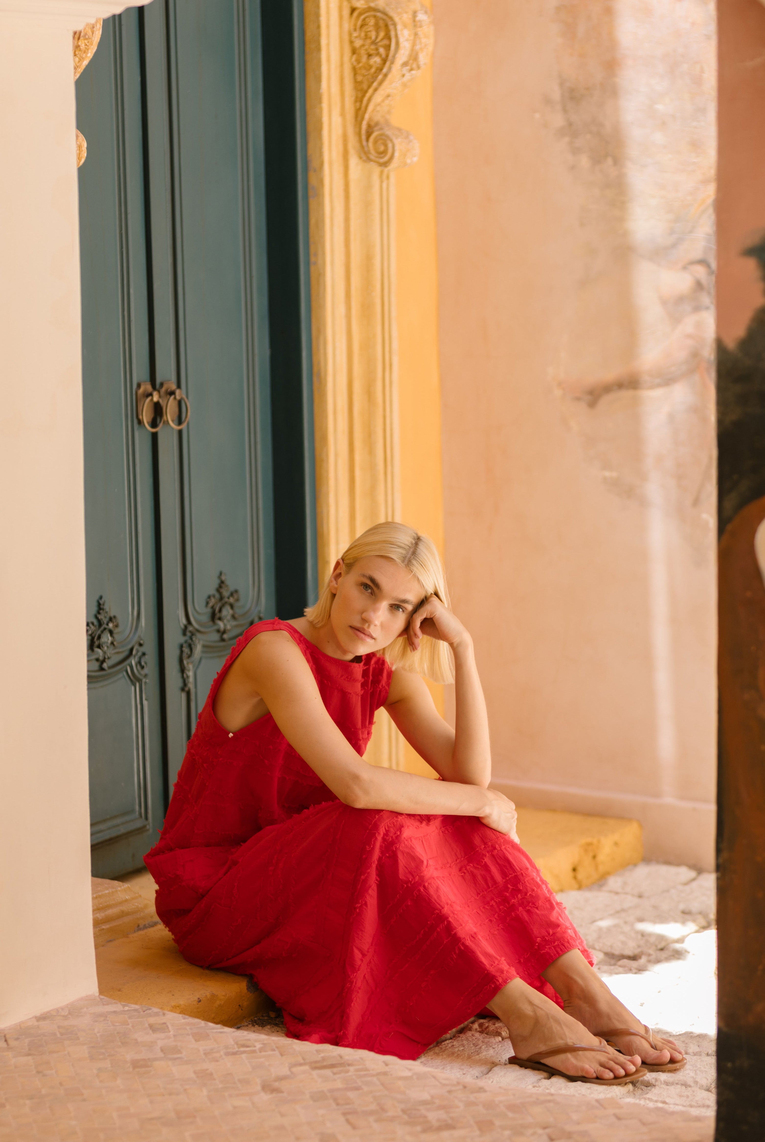 Red maxi dress pre-order spring 2026, bold feather print cotton dress for summer parties, garden events, and warm weather celebrations