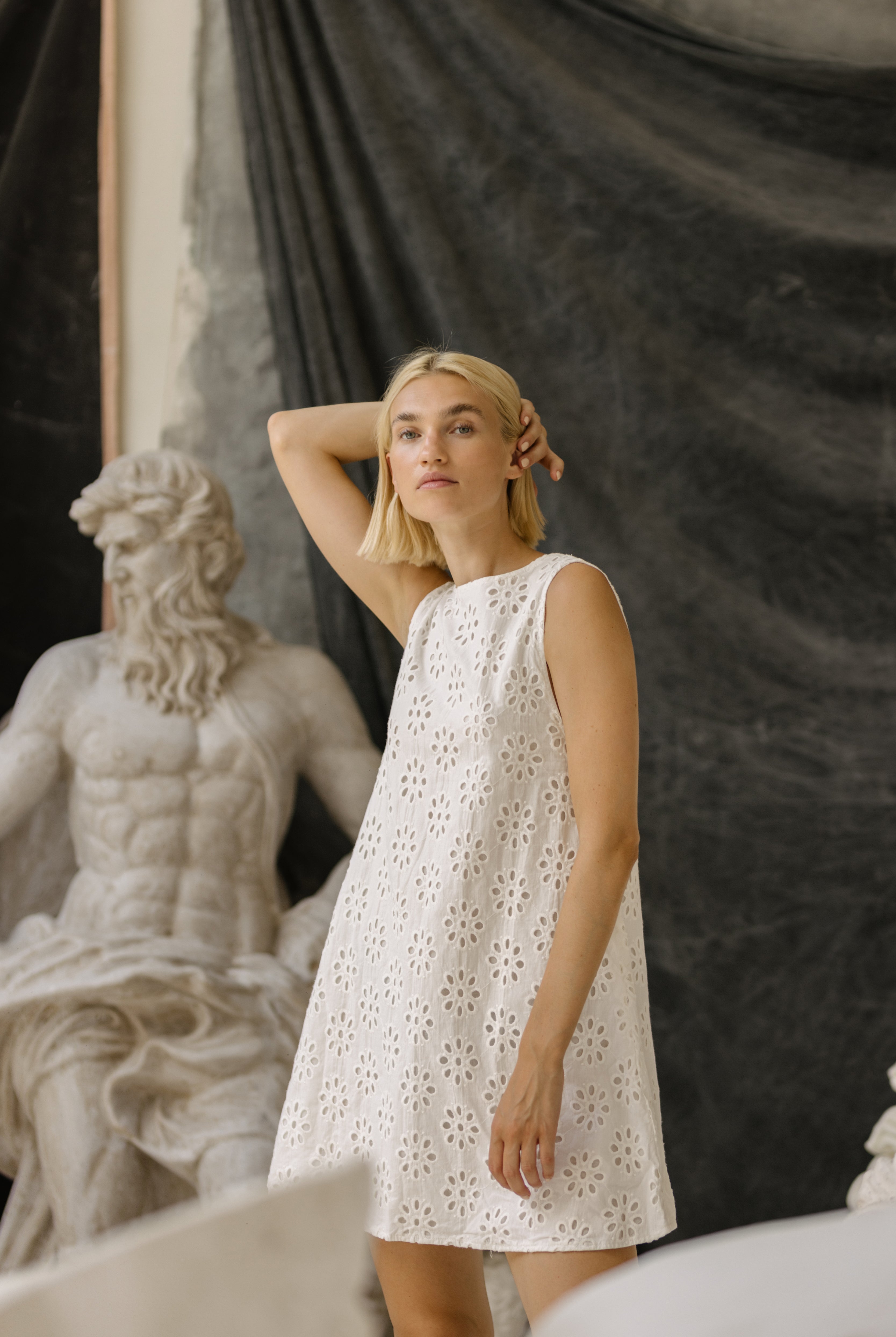 White floral eyelet mini dress Nantucket coastal spring outfit 2026, preppy cotton Mini Gili dress for East Coast beach town and harbor occasion