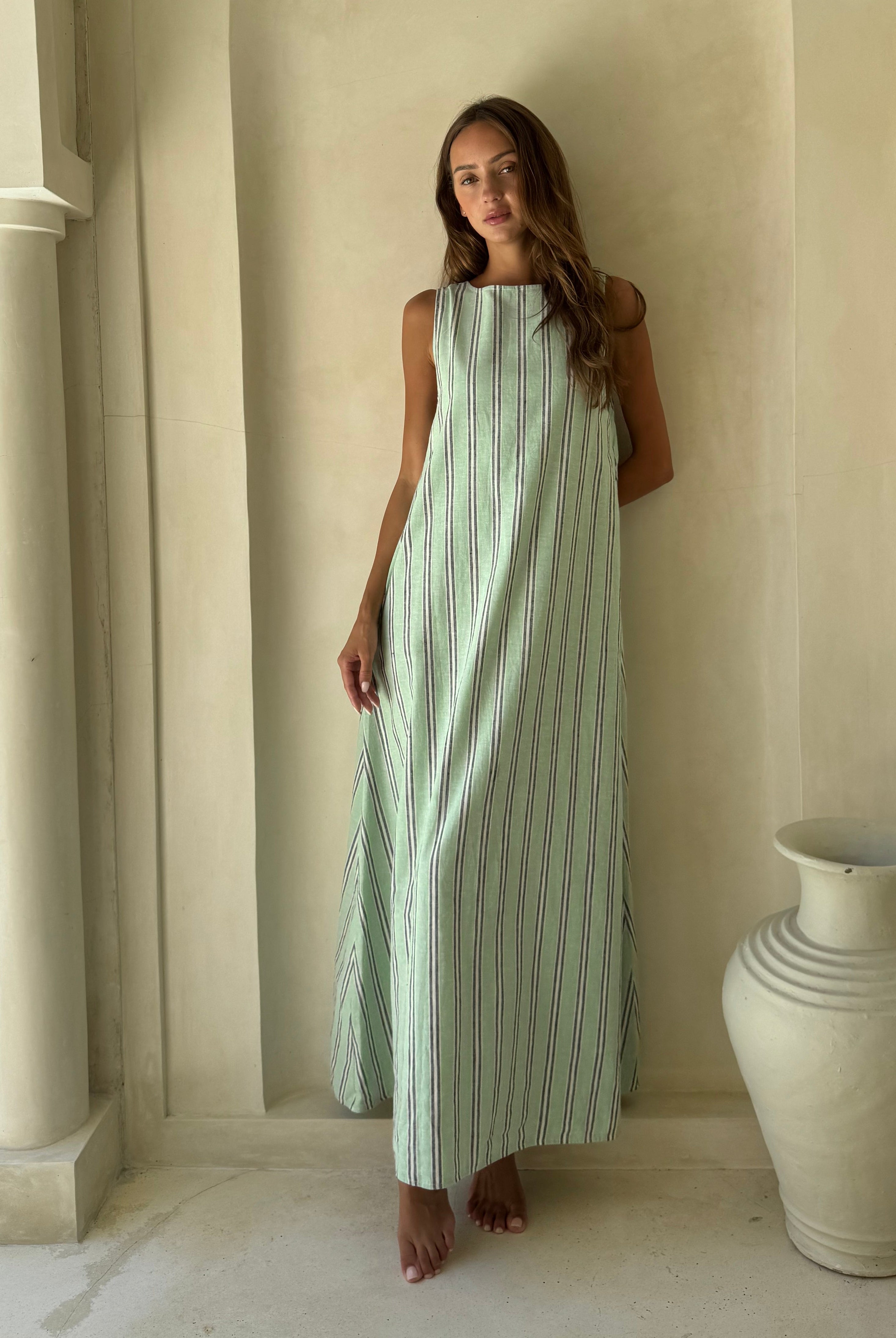 Gili Green Navy and White Stripe Maxi Dress for a French Riviera beach day, relaxed maxi silhouette for warm weather travel