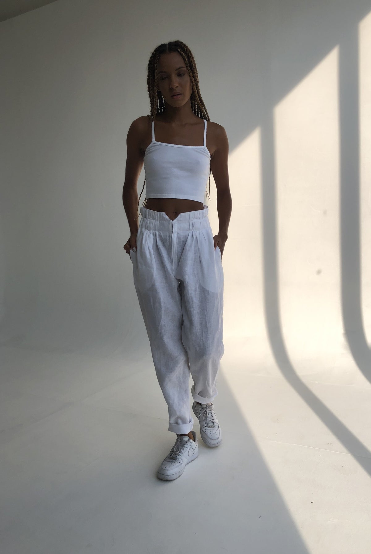 Puka Pantai Pant in White — flowy white linen pants for women, effortless warm weather style for vacation and coastal getaways