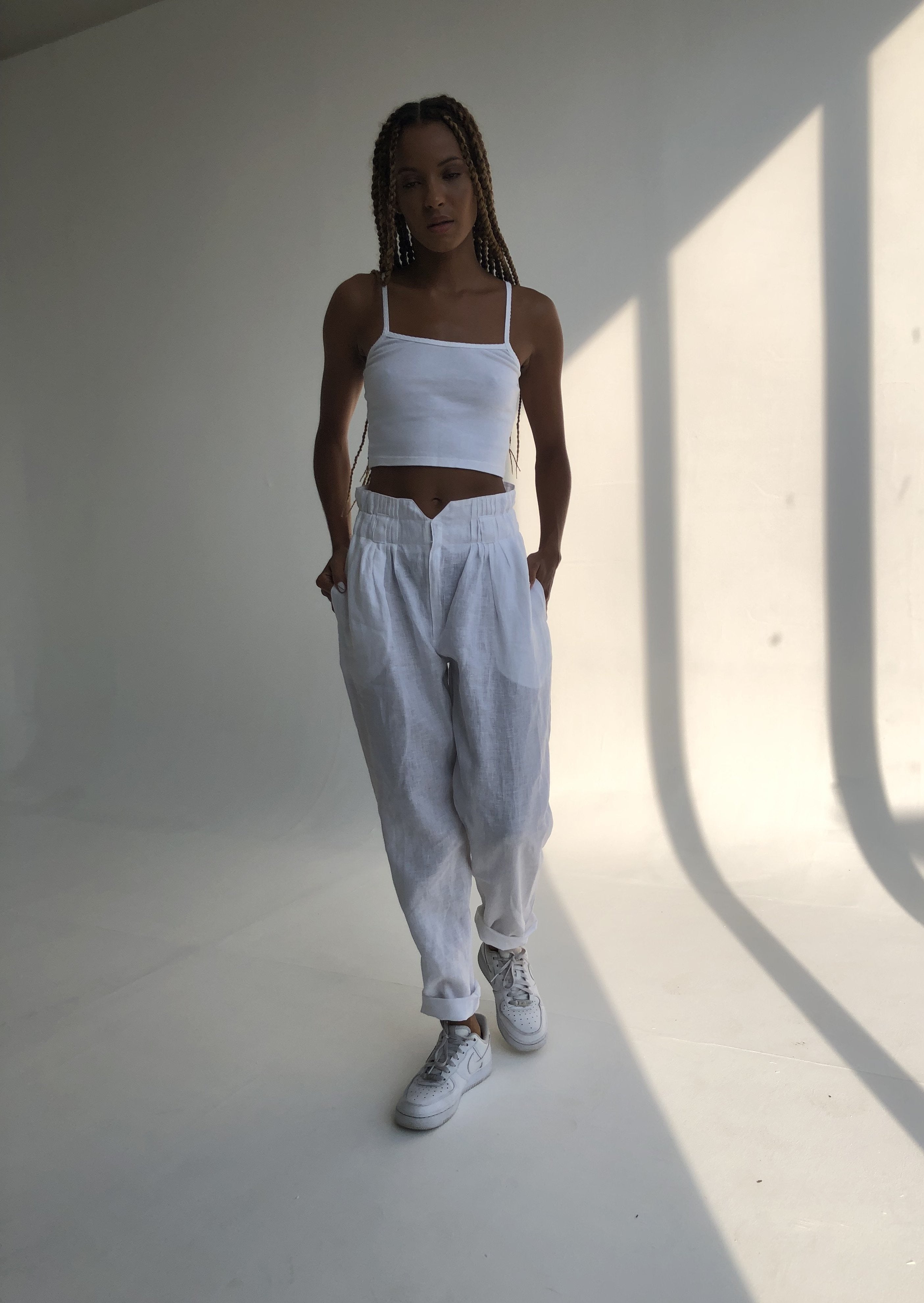 Puka Pantai Pant in White — flowy white linen pants for women, effortless warm weather style for vacation and coastal getaways