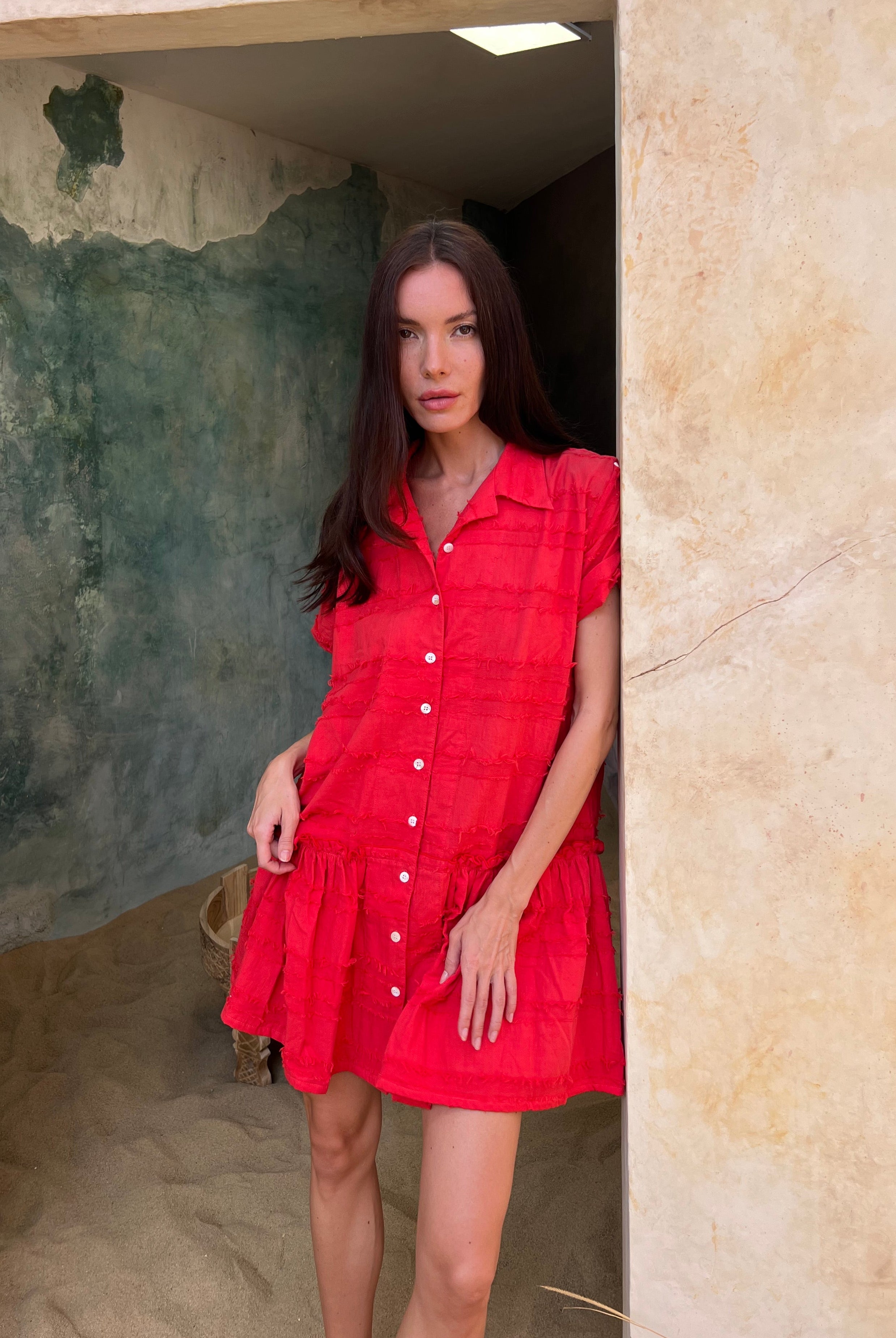 Coral textured cotton button-up mini dress beach vacation outfit summer 2026, vibrant feminine Ripley Dress for tropical travel and resort getaway