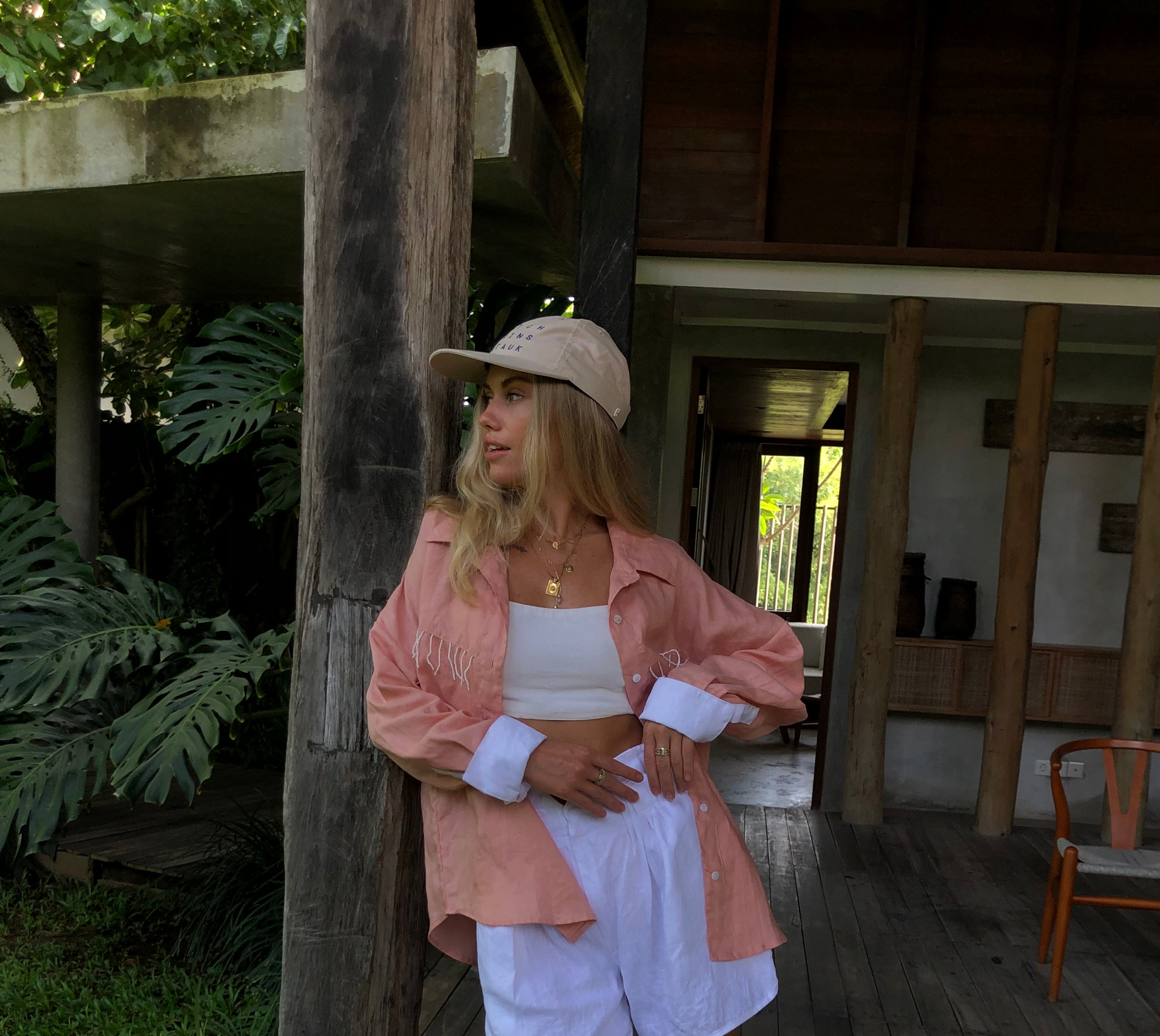 Peach Ulu fringe top styled as a fall outfit by Puka The Label — warm tones, white fringe detail, elevated Texas ranch aesthetic