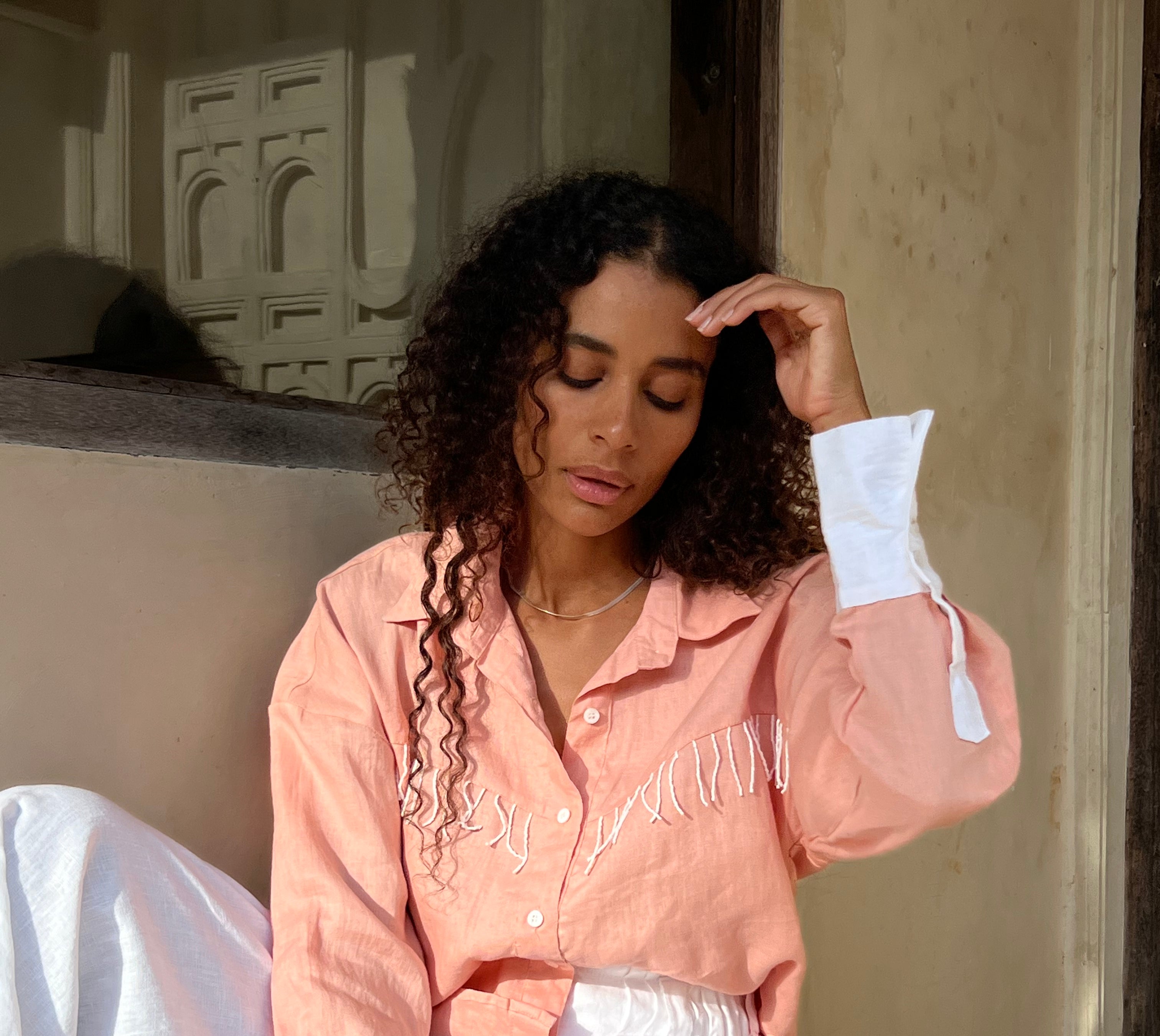 Peach Oversized Ulu fringe button-up top by Puka The Label — styled for Round Top Texas festival season in warm peach linen
