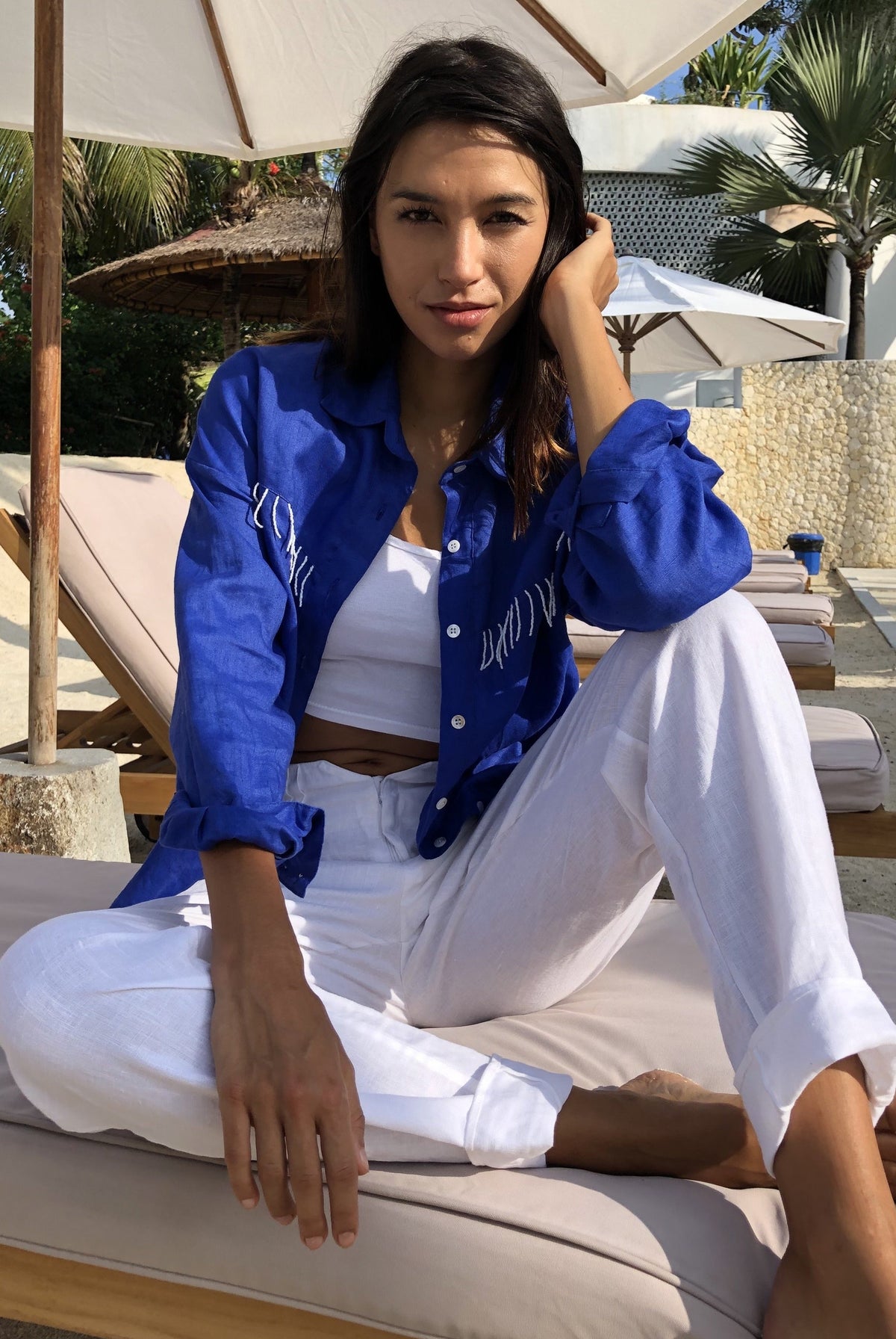 Puka white linen pants outfit — Pantai Pant in White styled as a complete easy beach look for women