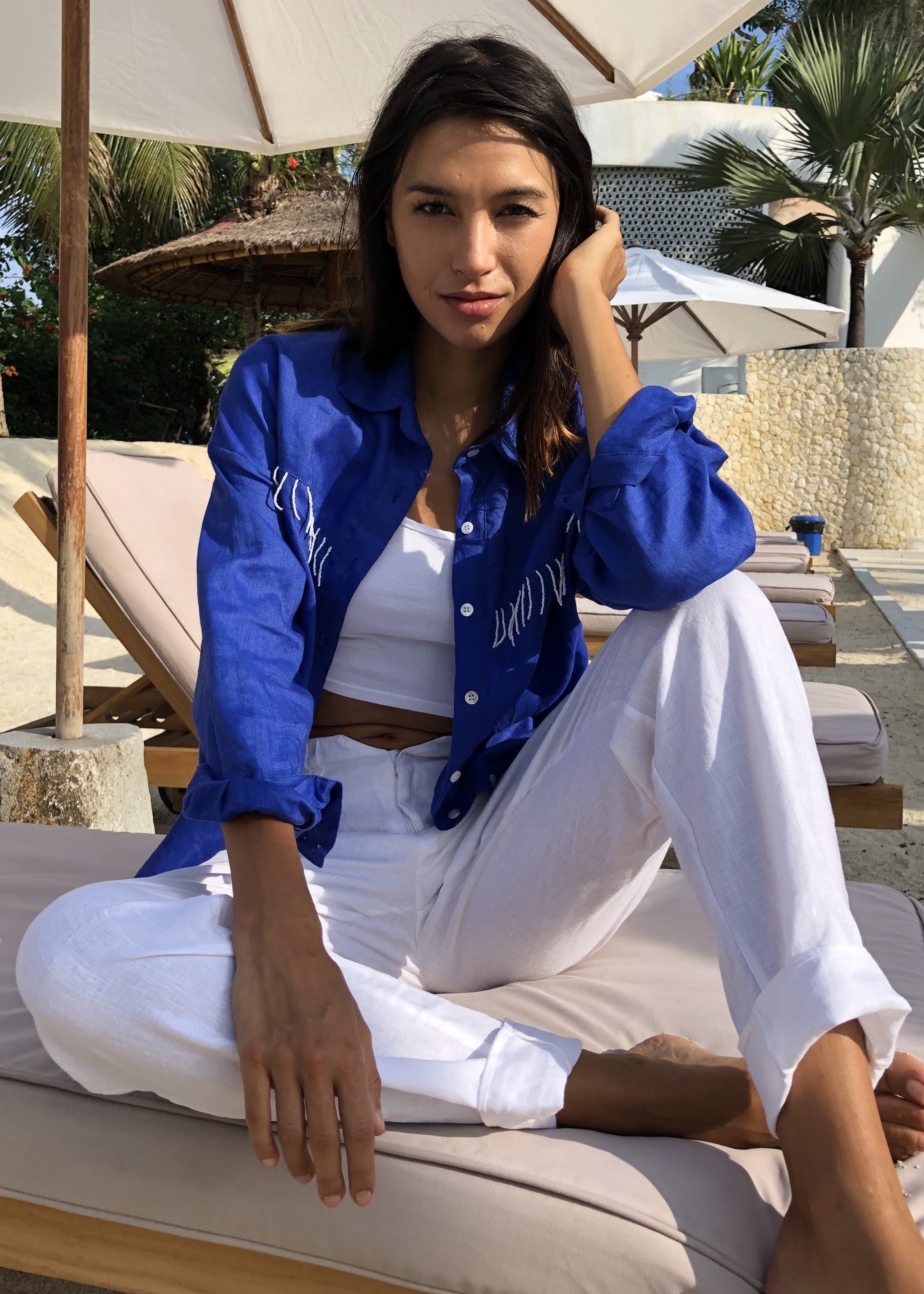 Puka white linen pants outfit — Pantai Pant in White styled as a complete easy beach look for women