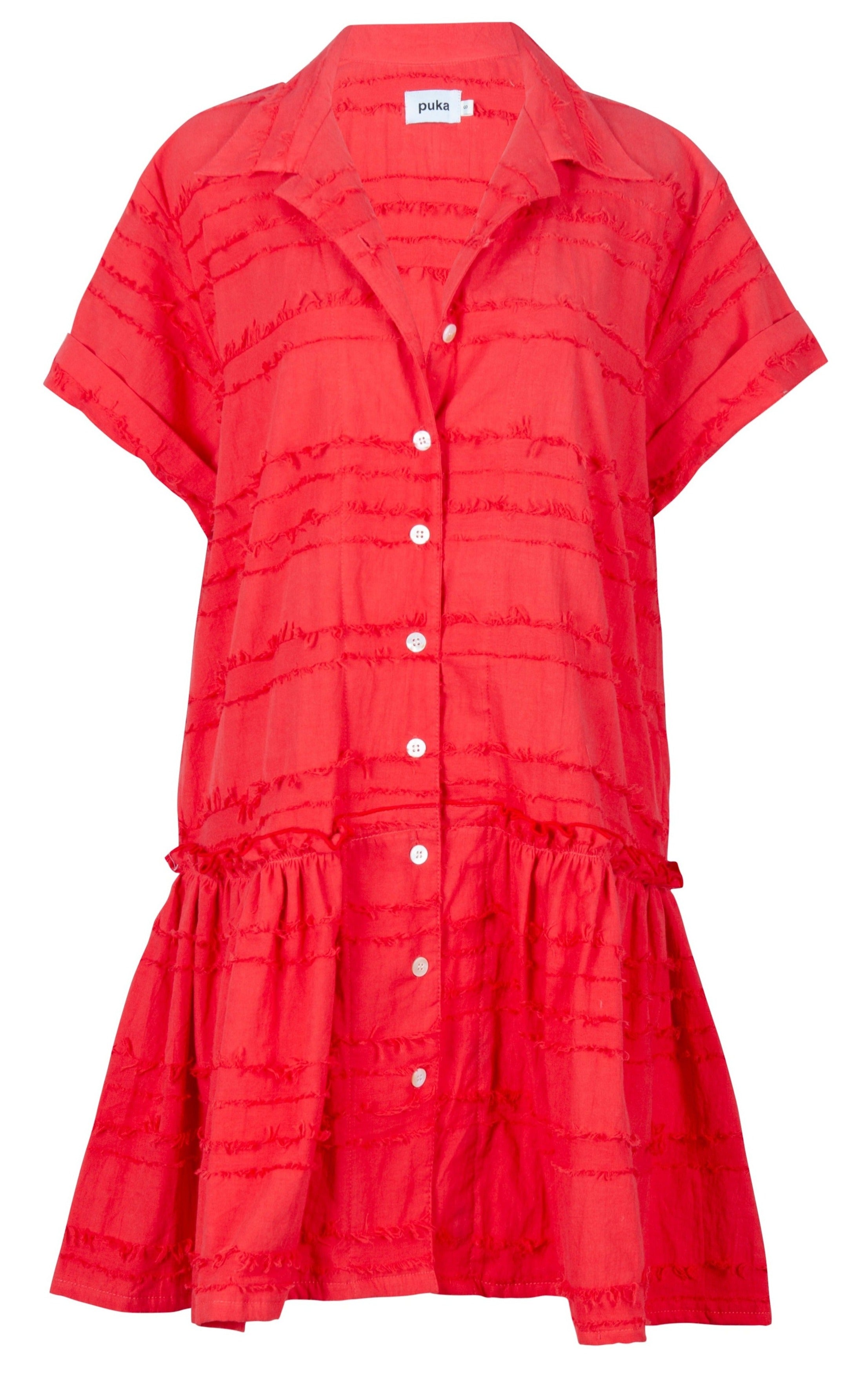 Ripley Dress coral ghost mannequin flat lay, textured cotton short sleeve button-up mini dress 100% cotton, preppy, easy to throw on dresses, Puka The Label 2026