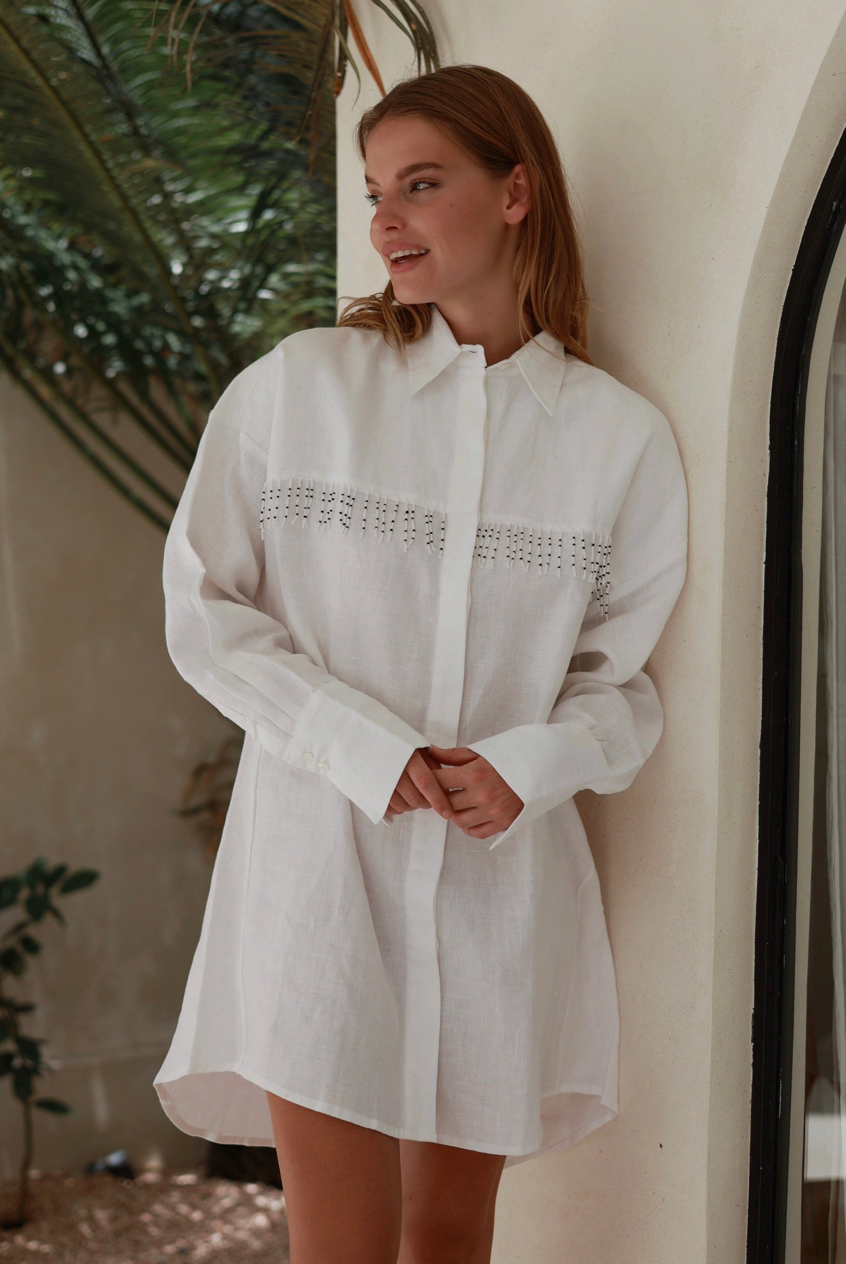 hite linen fringe button-up dress Texas ranch weekend and Hill Country summer outfit 2026, unique artisan linen dress for warm weather getaway