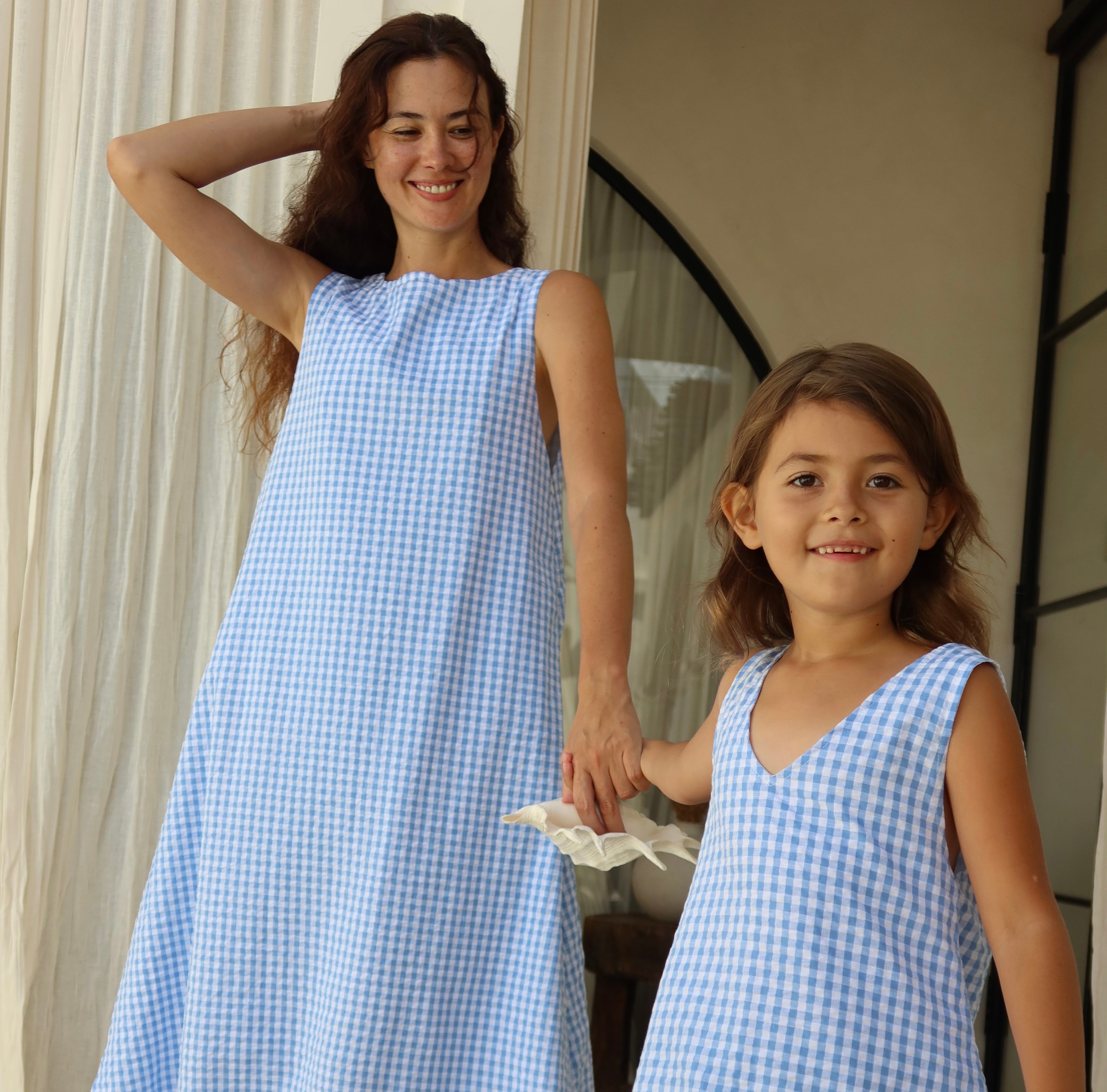 Mommy and Daughter outfits in light blue gingham. Matching cute family outfits for spring and summer 2026
