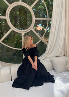 Simple chic flowy black gown, off the shoulder