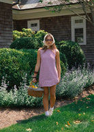 Influencer Hannah Lovey Style wearing red gingham mini dress by Puka The Label styled out east, summer outfit, casual beach dress, influencer fashion