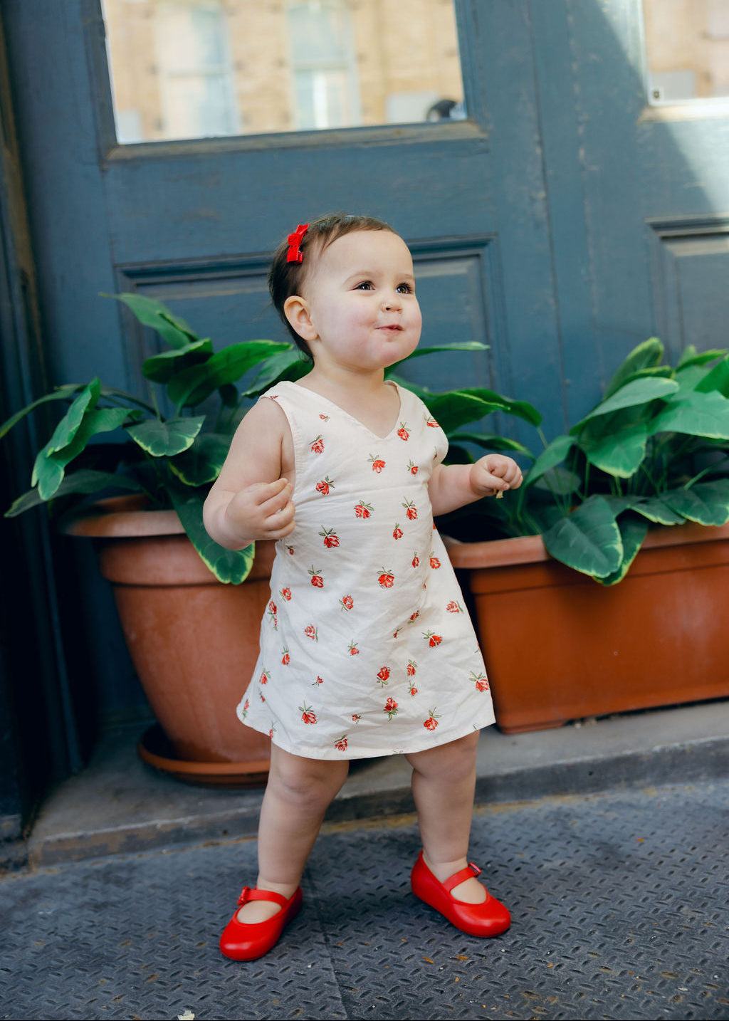 Little Gili Red Posey toddler girls floral dress, cream cotton Easter spring summer kids dress with red rose print by Puka The Label