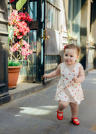 Full length Mommy and Me matching Red Posey floral dresses outdoors, Little Gili girls spring summer Easter kids dress by Puka The Label