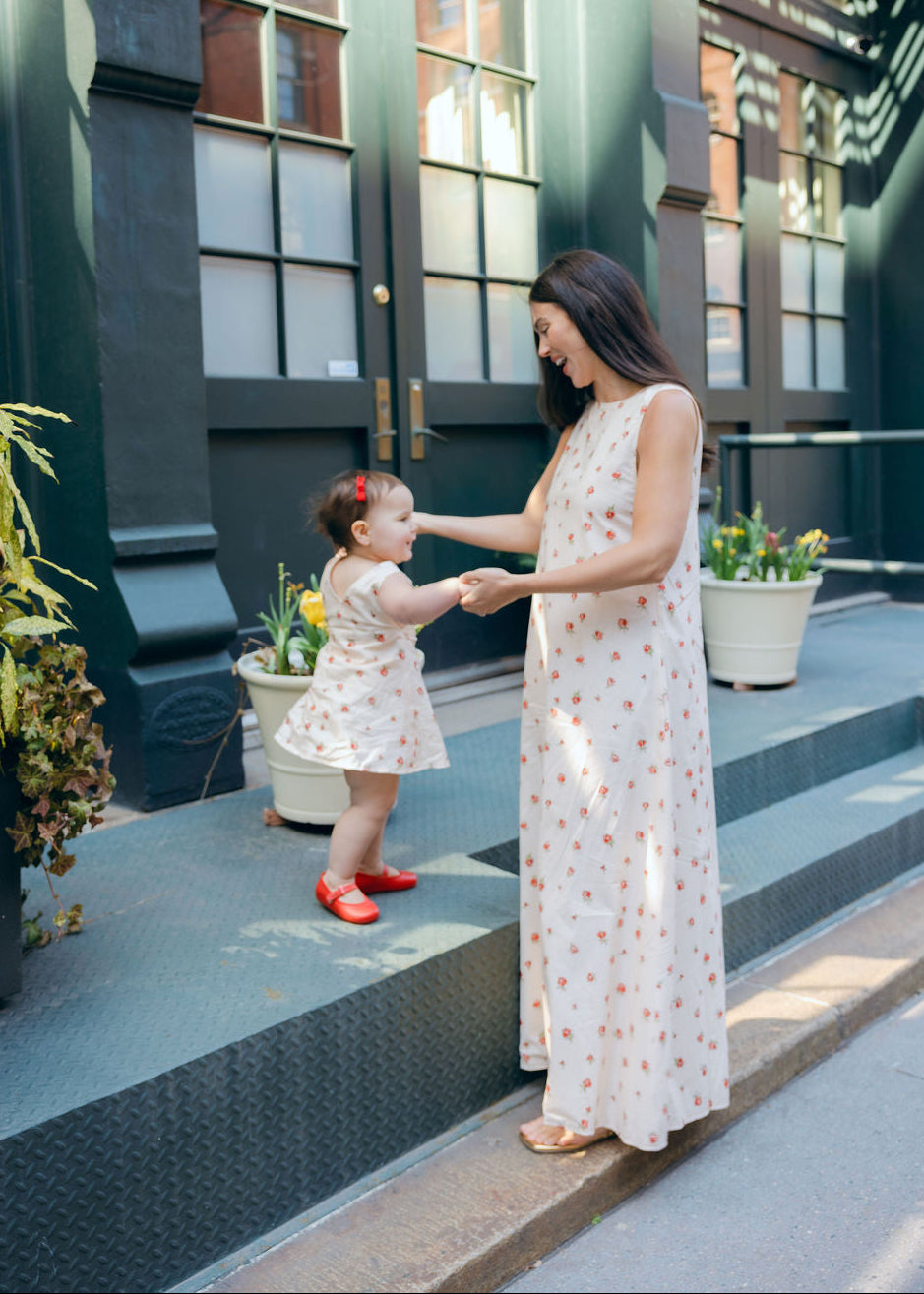 Mommy and Me sweet moment in matching Red Posey spring summer floral girls kids dress and adult maxi dress by Puka The Label
