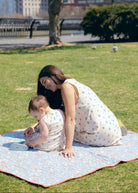 Blue Posey Mini Gili V-neck Mommy and Me picnic spring 2026, mother daughter matching blue floral cotton dress outdoor Puka The Label